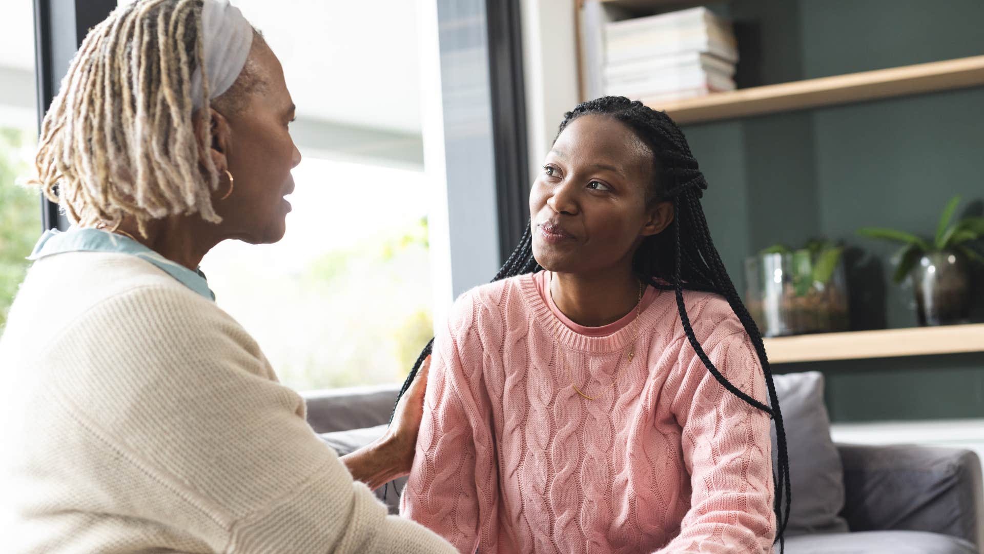 mother scolding adult daughter saying you should be grateful