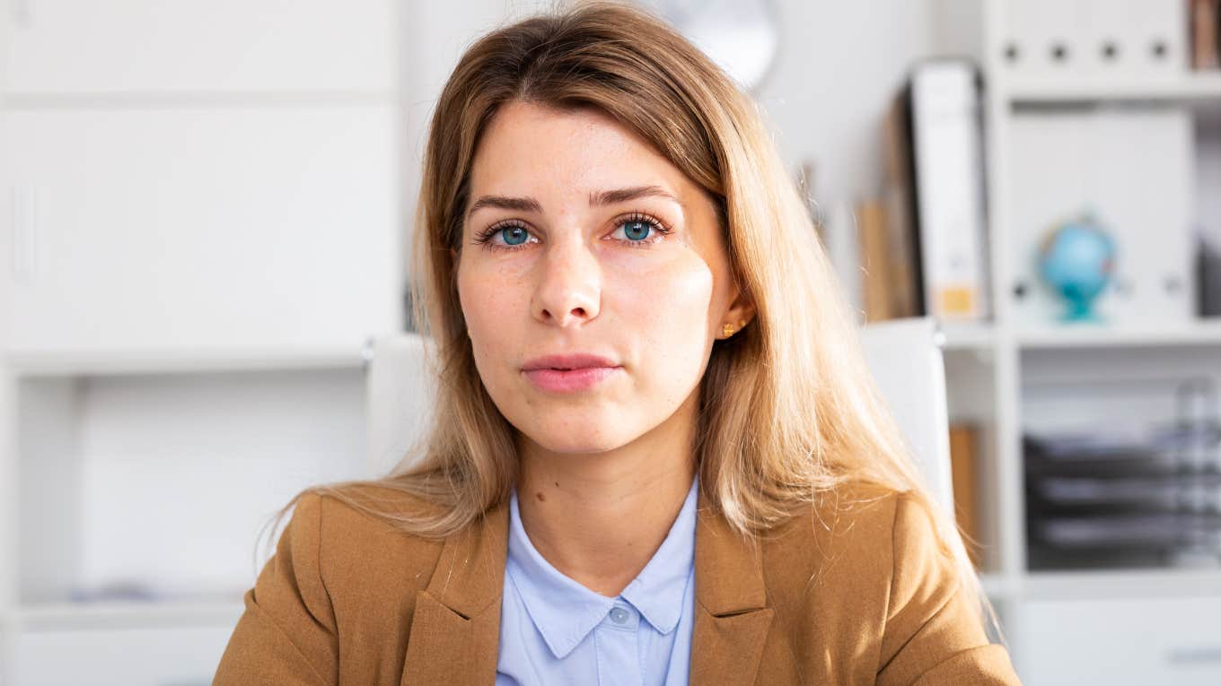 Phrases People Say That Reveal How Much Money They Really Have money conscious woman thinking about her finances