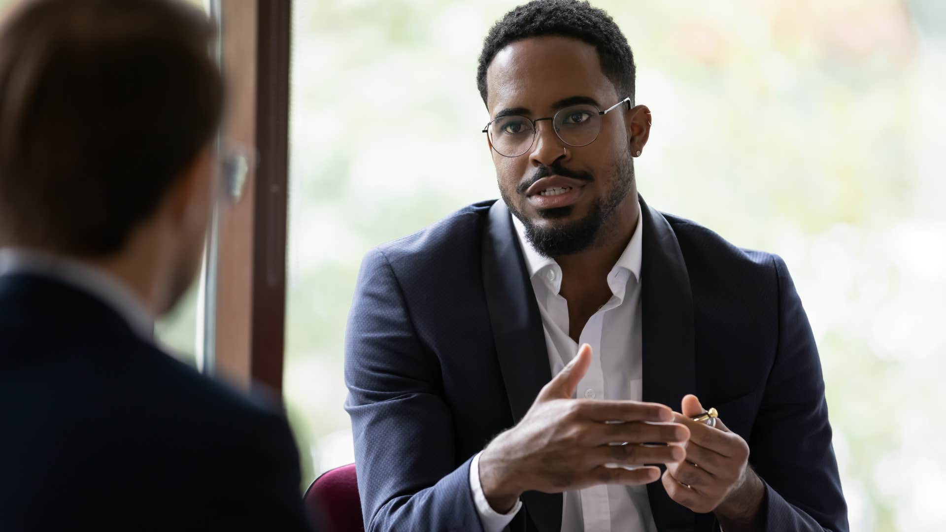 Man saying "let's focus on this, not personal attacks" at work.