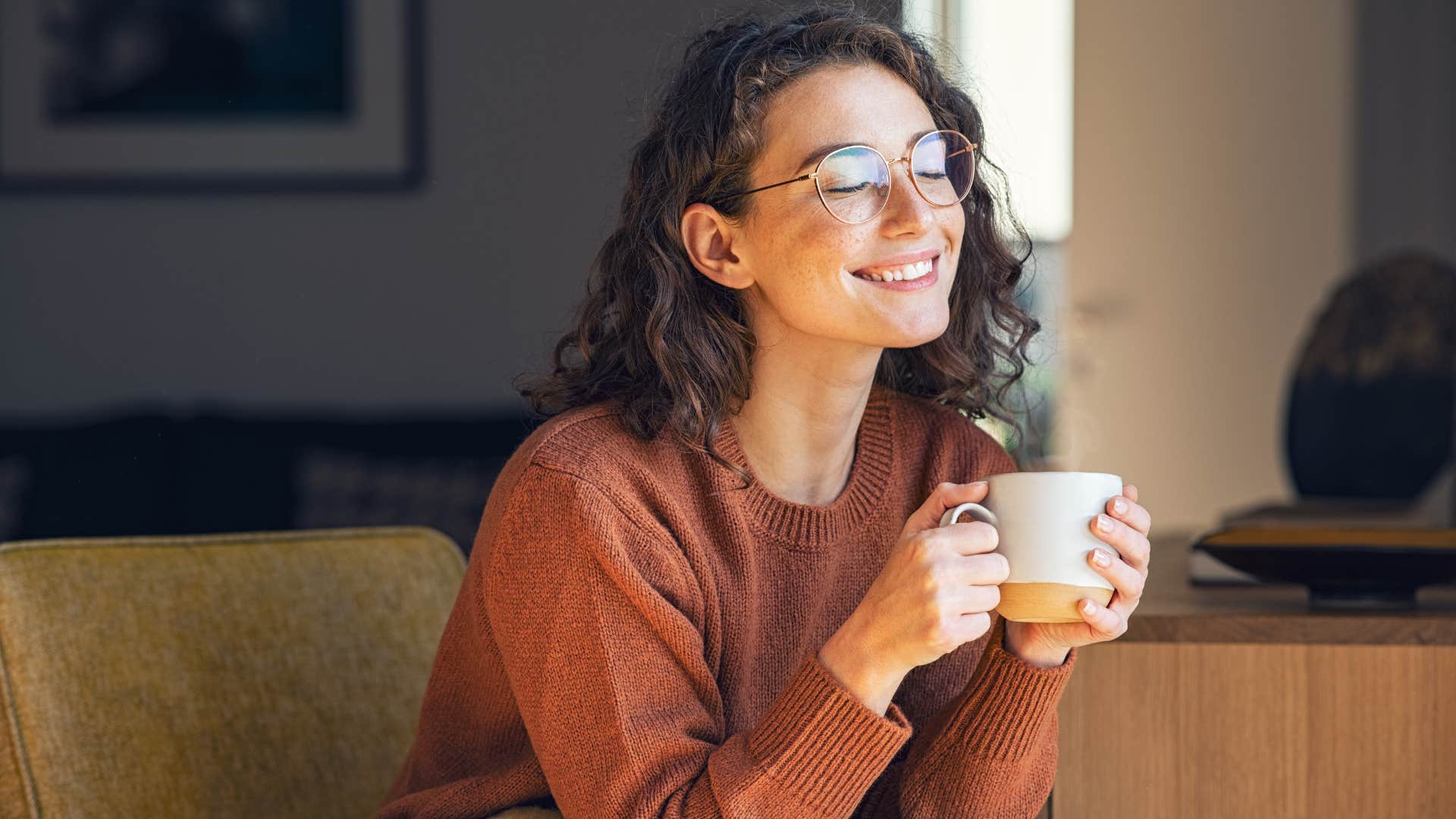 woman following cliche advice of not texting ex