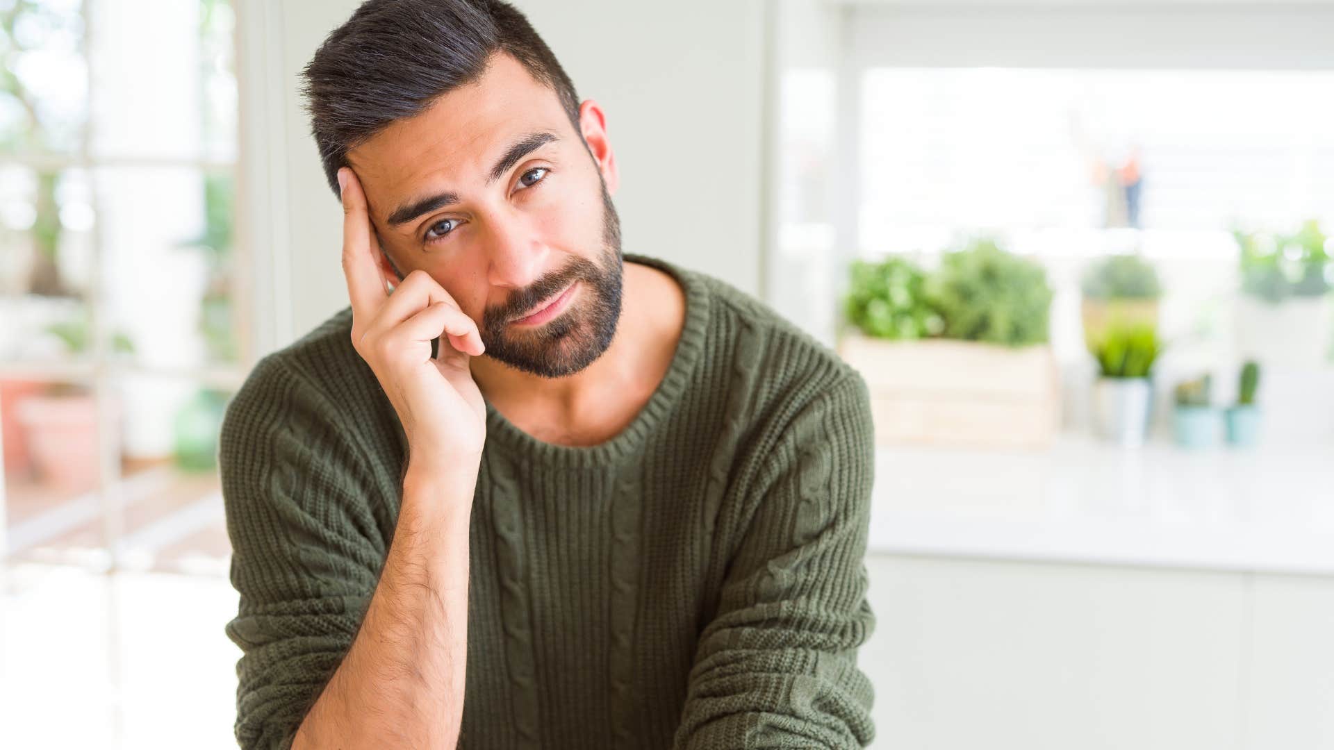 man thinking processing pain of breakup