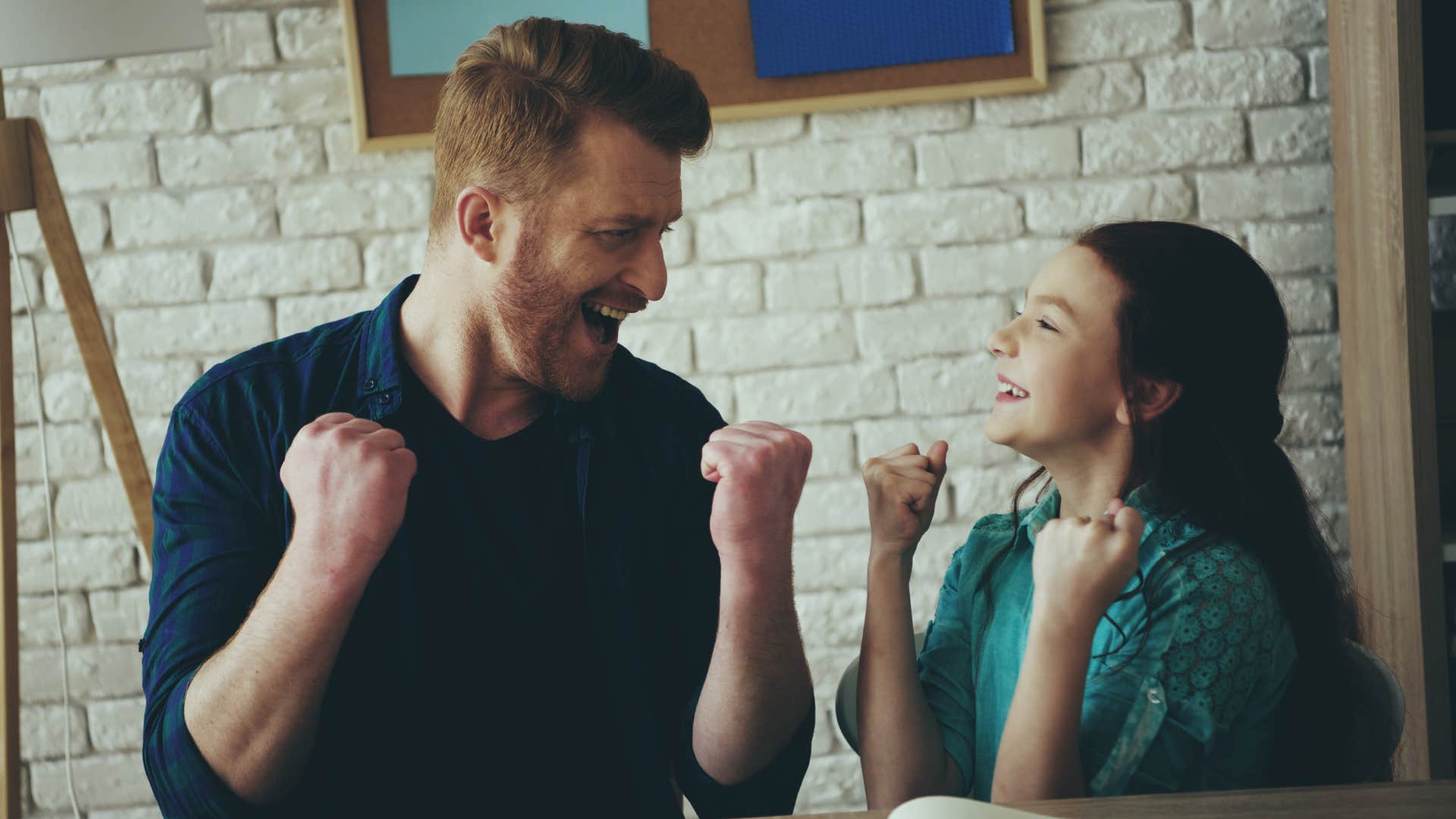 dad who doesn't want to slow his daughter down playing