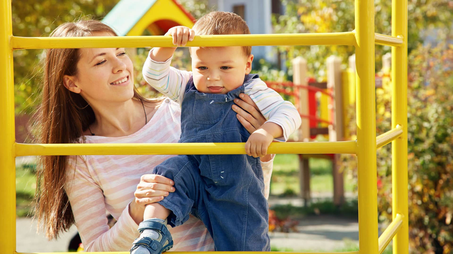 woman who is allowing her child to take a risk