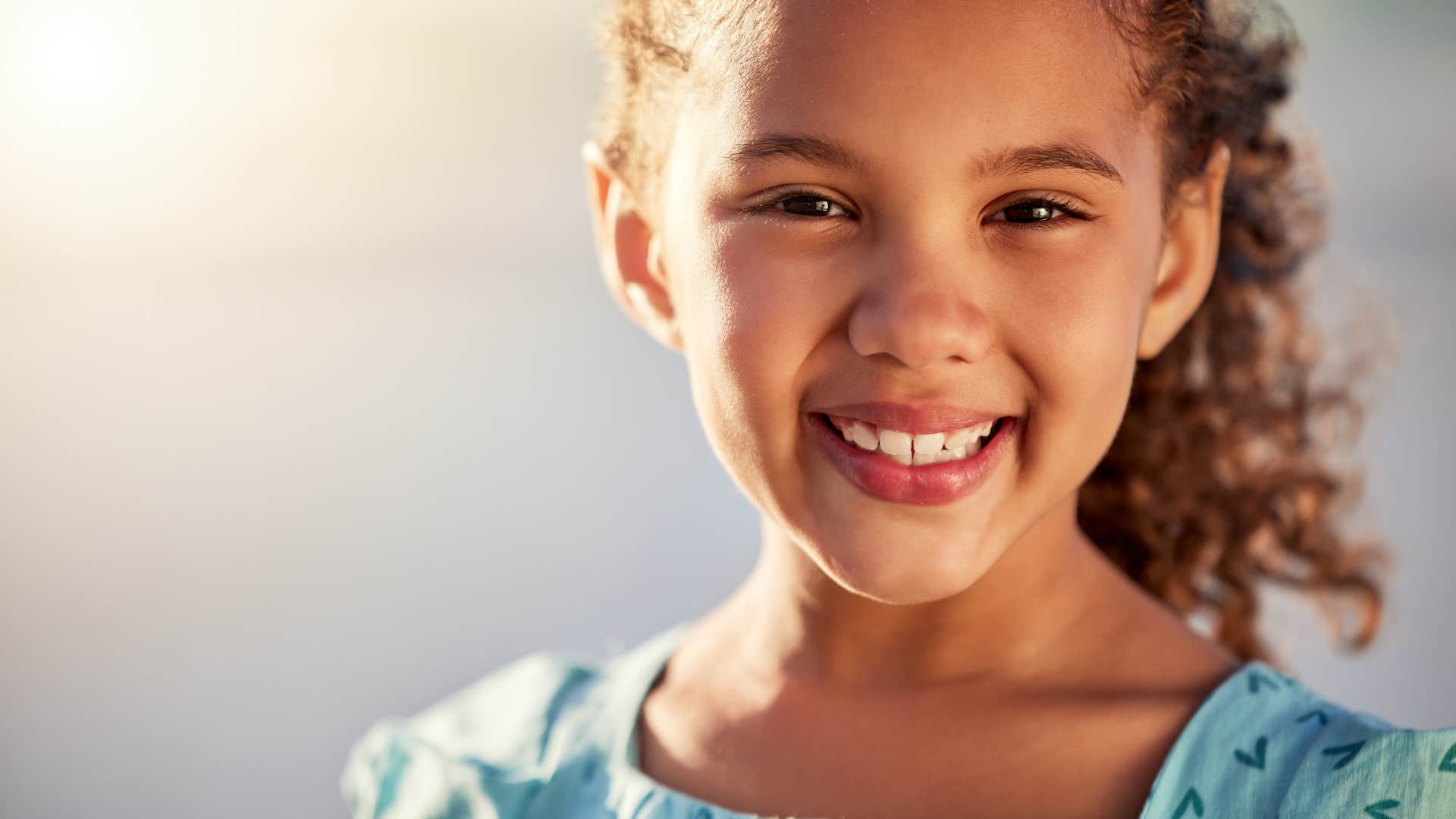 child who knows letting go with love will help her be happy