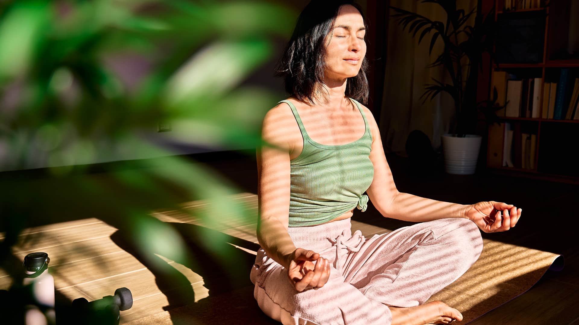 woman who is living a mindful life in a comfortable position