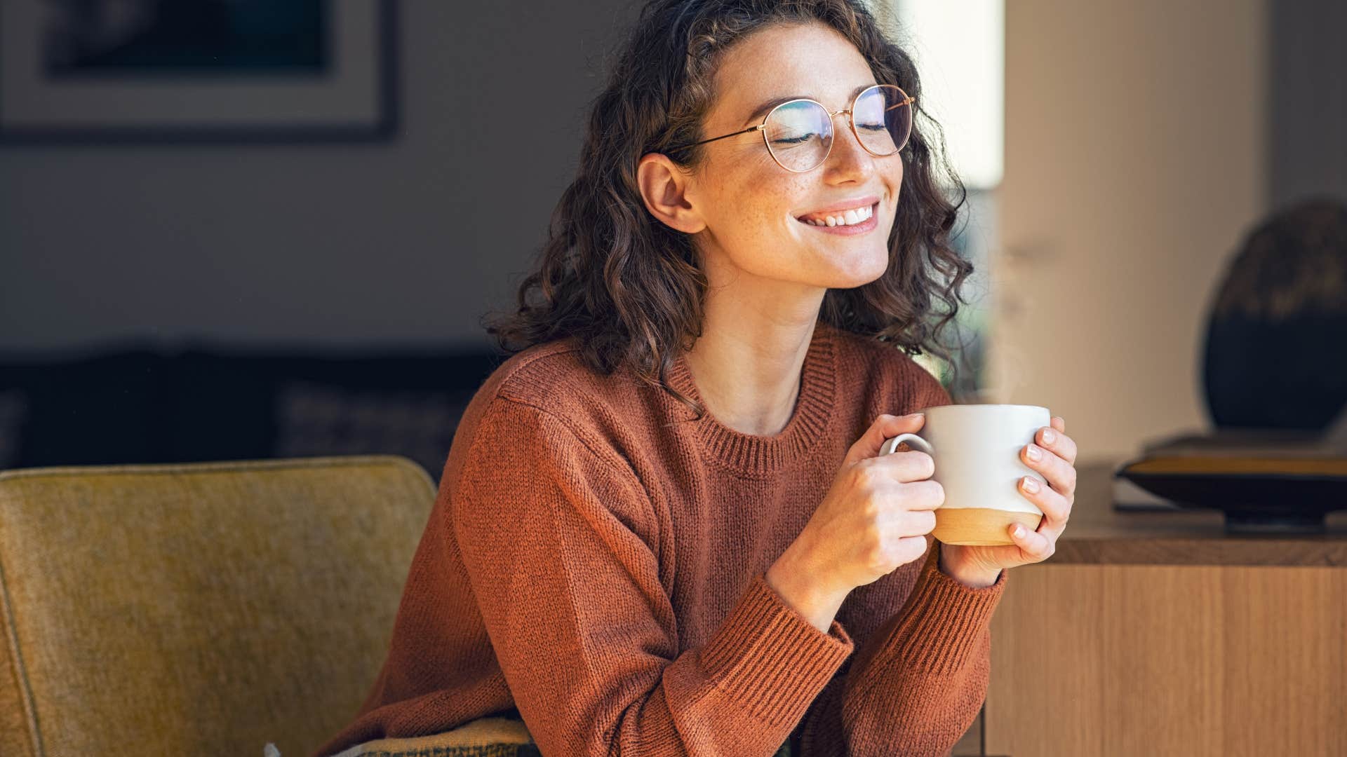 woman who lives a mindful life as she relaxes