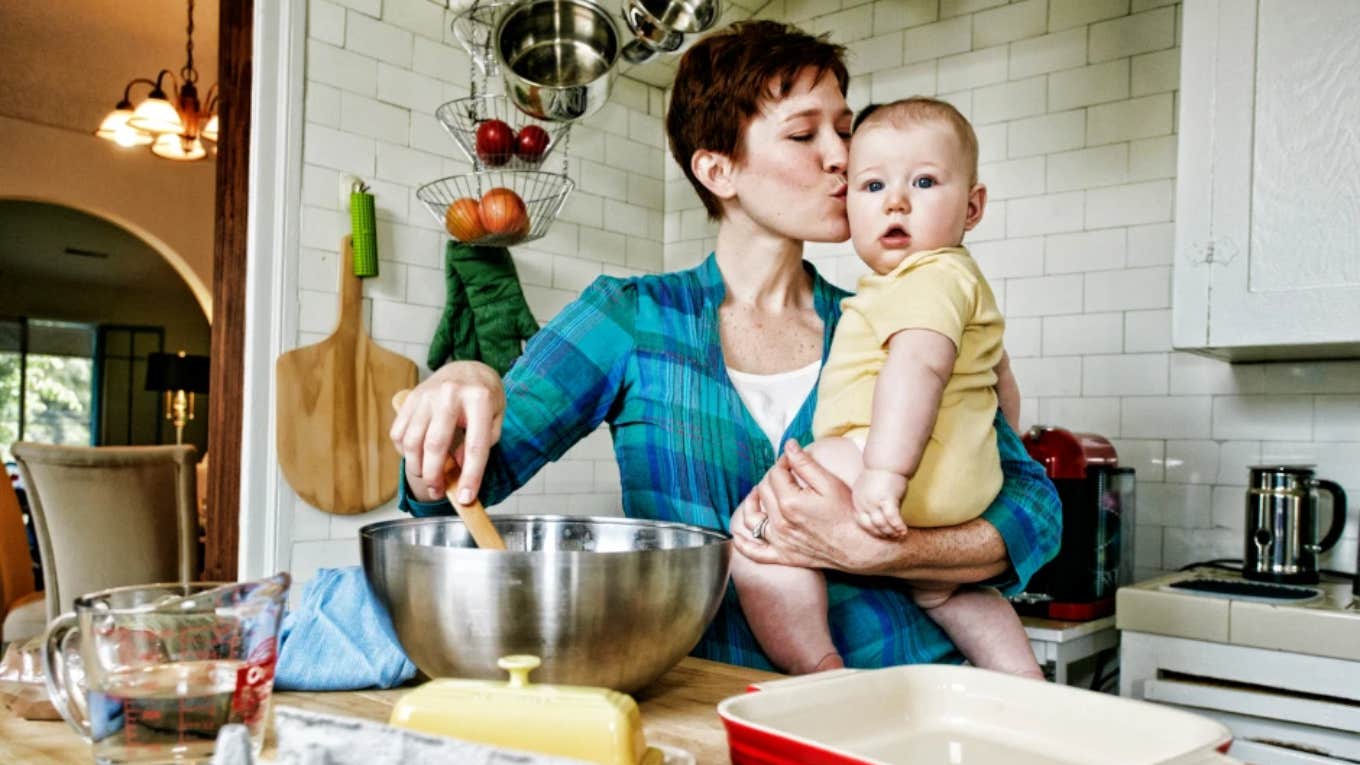 The Science Behind Why You Want To Eat A Cute Baby Or Puppy woman kissing baby