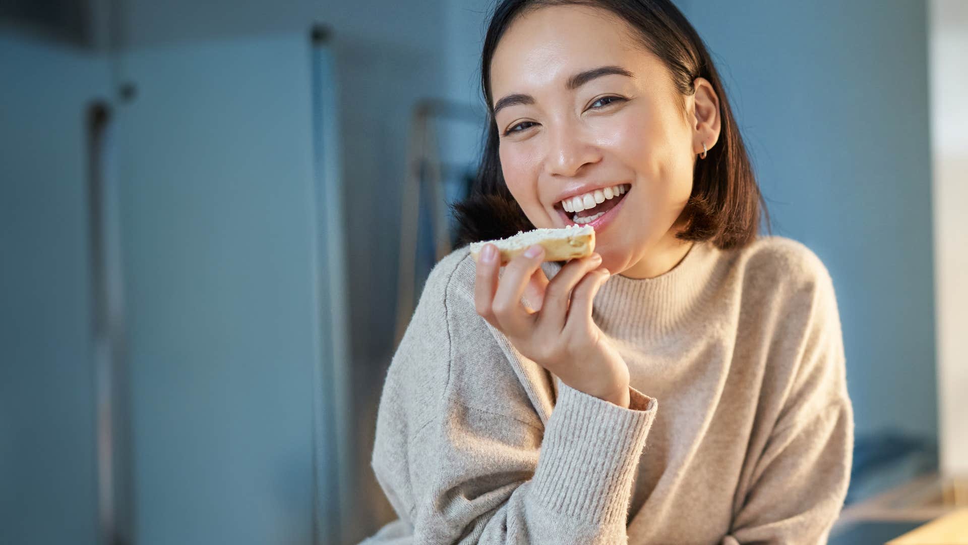 woman eating bread and butter