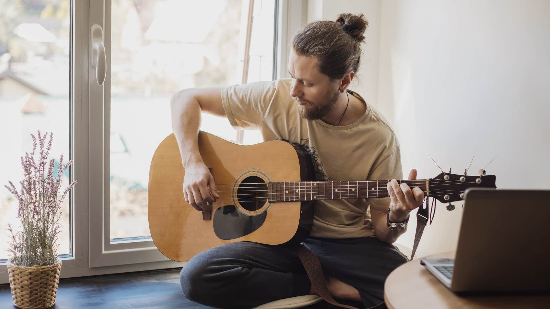 musician playing guitar