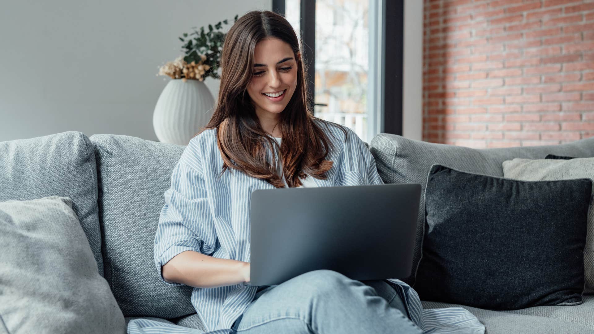 writing creating content on laptop