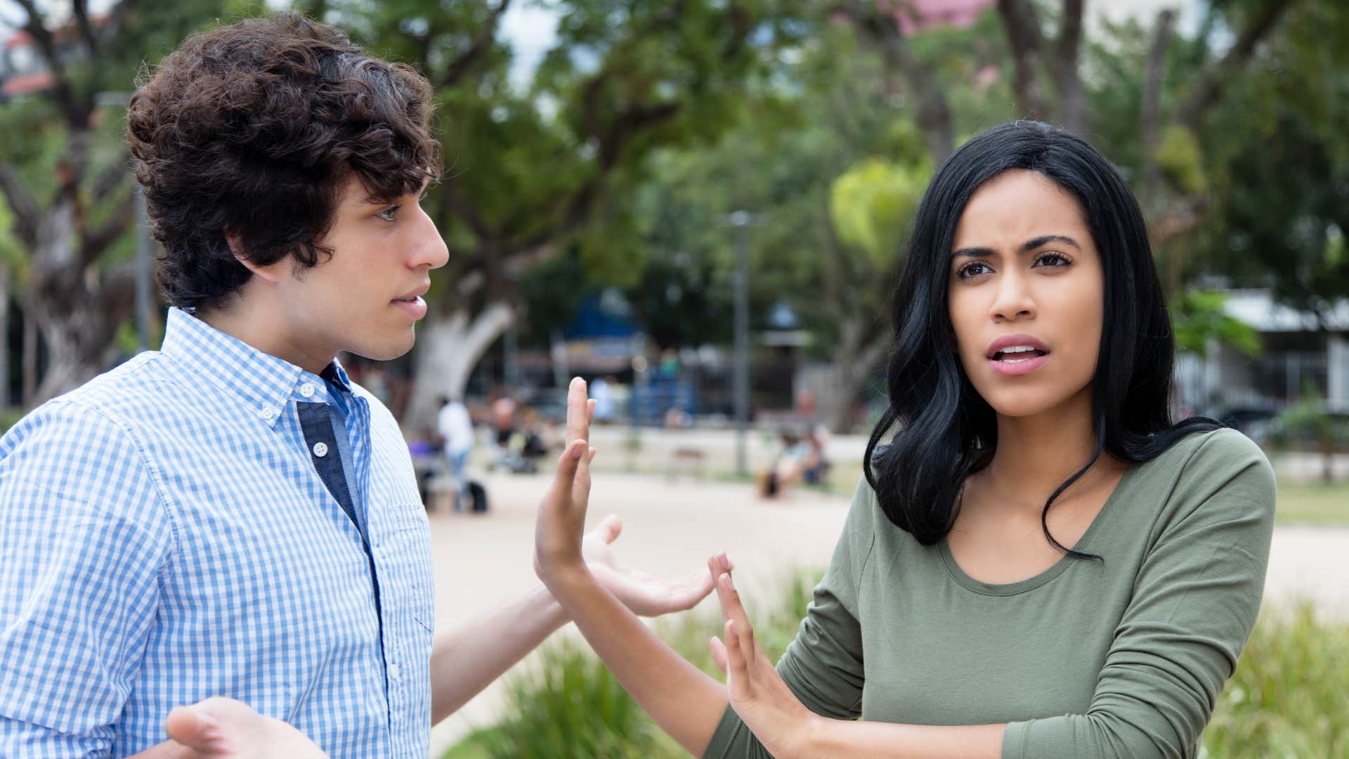 Uninterested woman talks about other guys