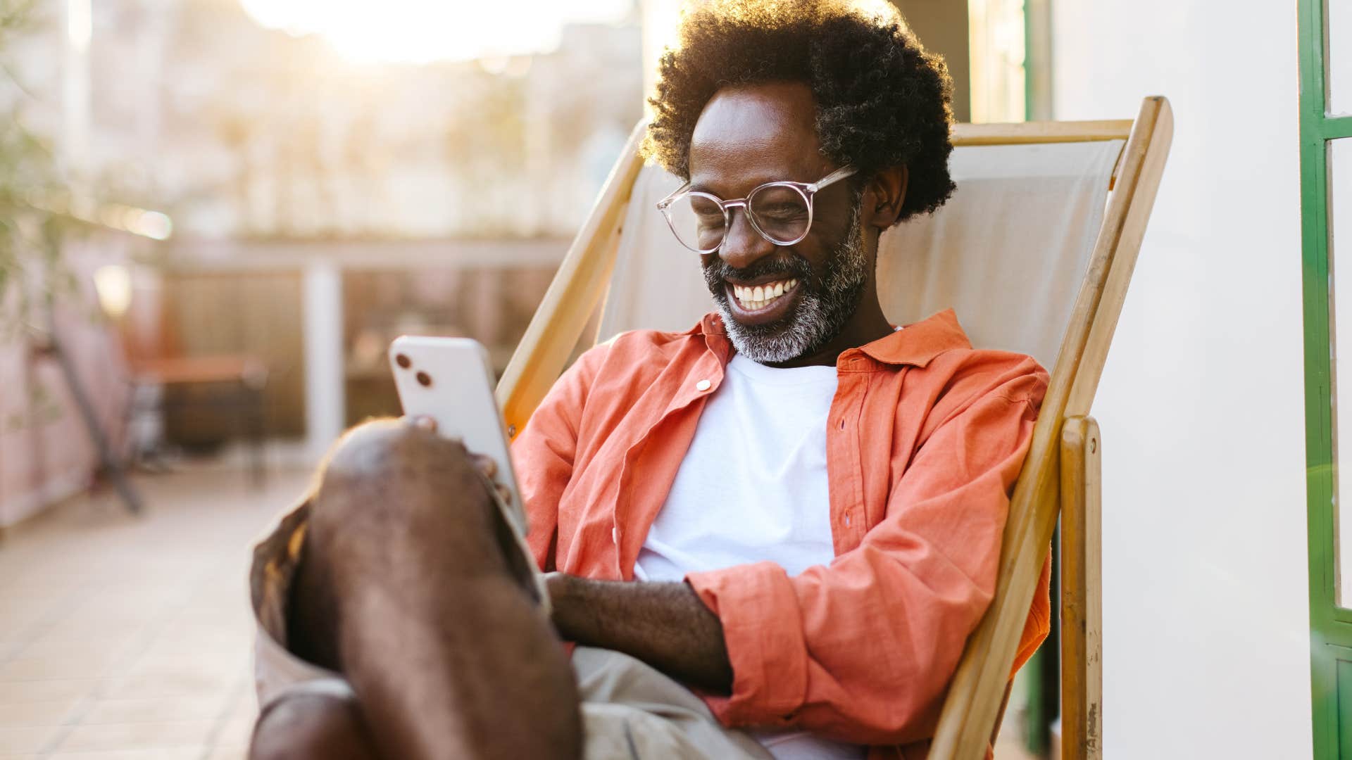 man who doesn't seek external validation looking at his phone