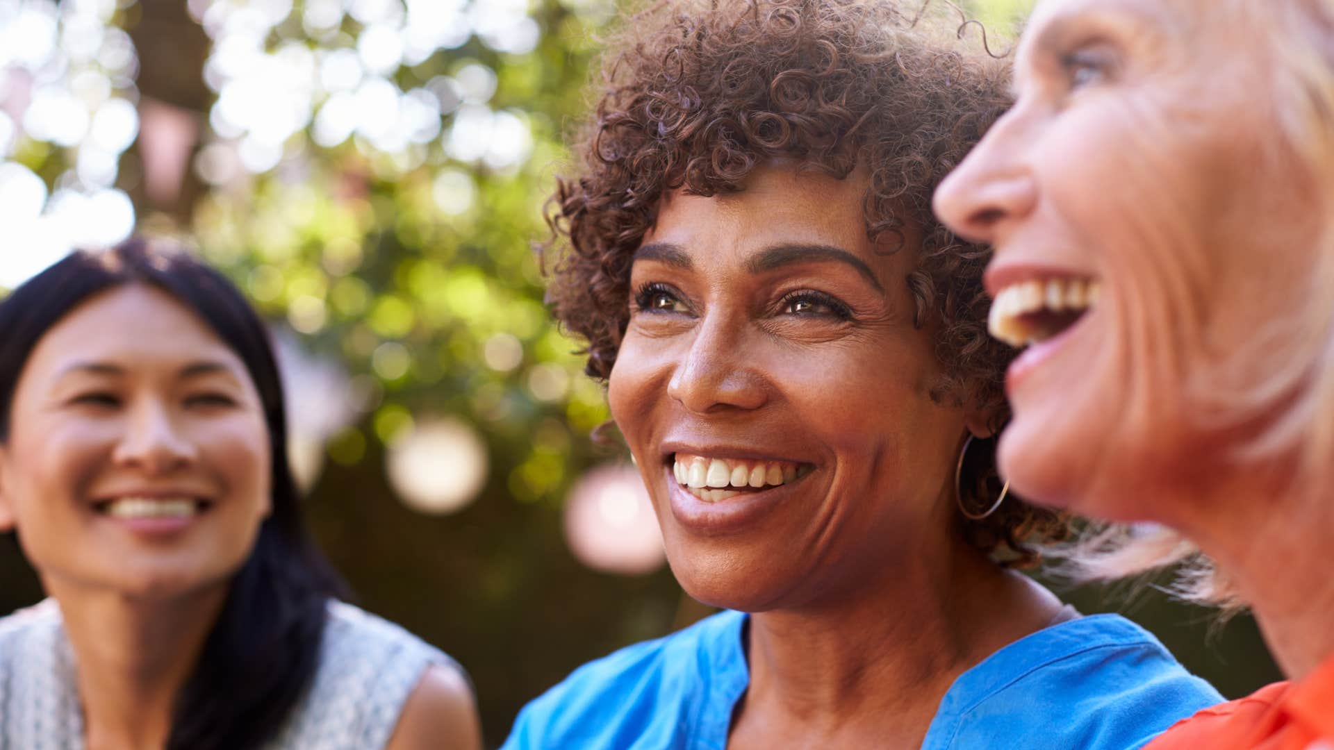happy women laughing at themselves