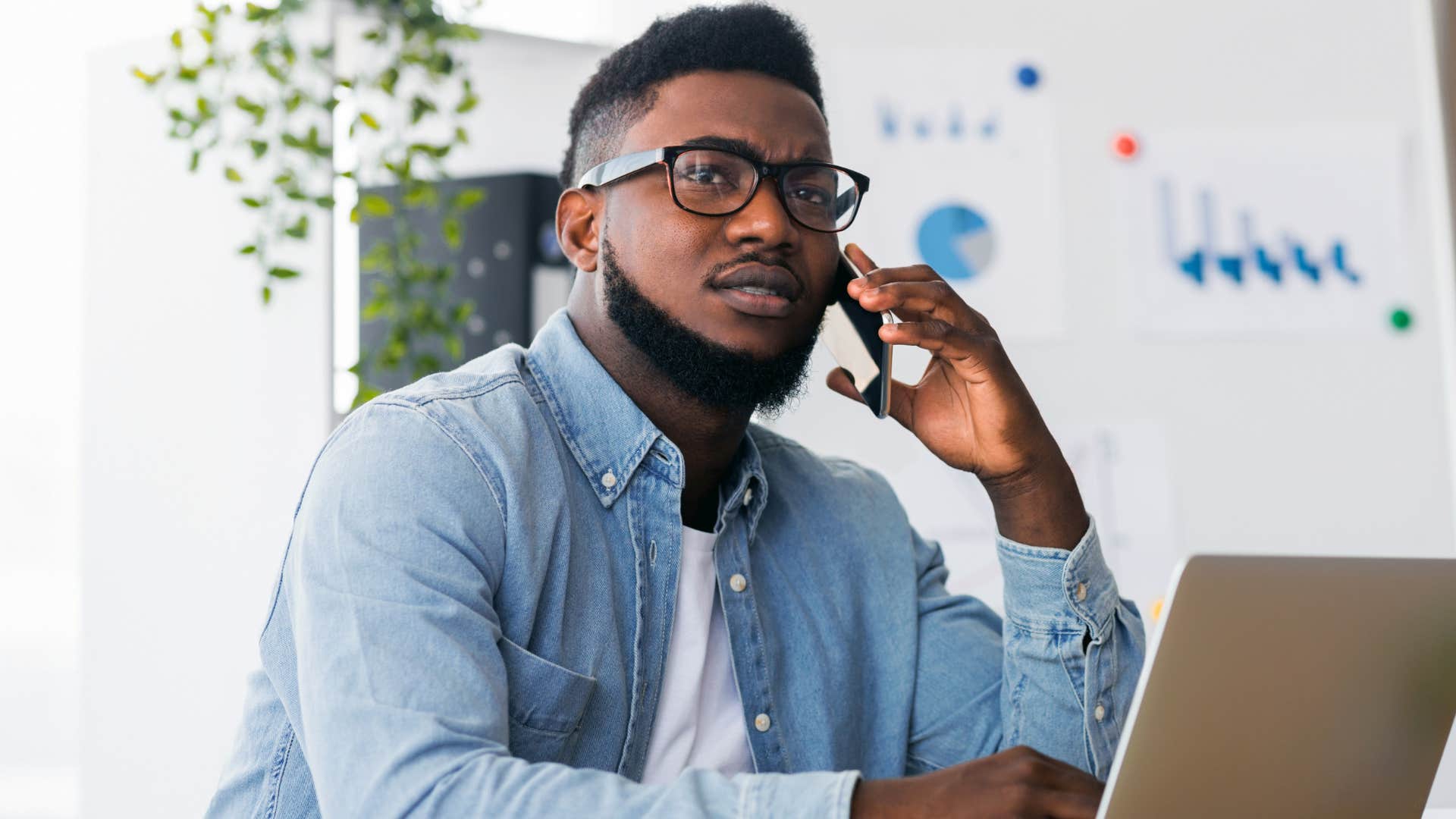 man who's resourceful under pressure talking on the phone