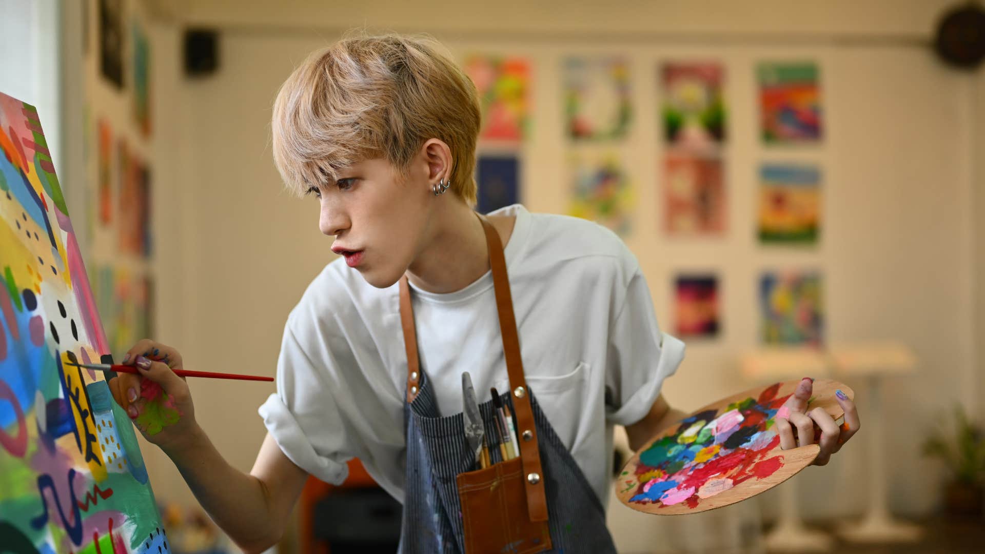 creative lone wolf young man painting