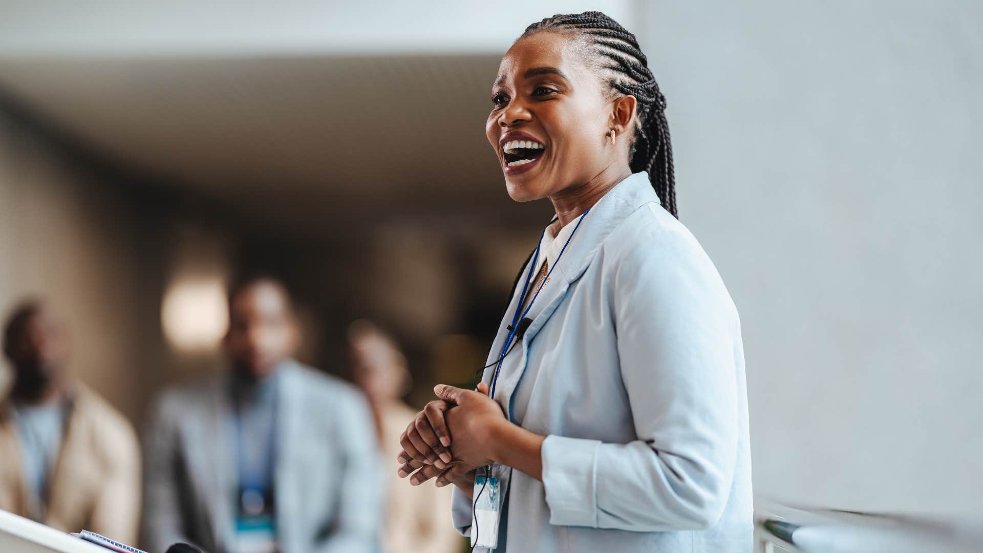self-motivated woman giving presentation