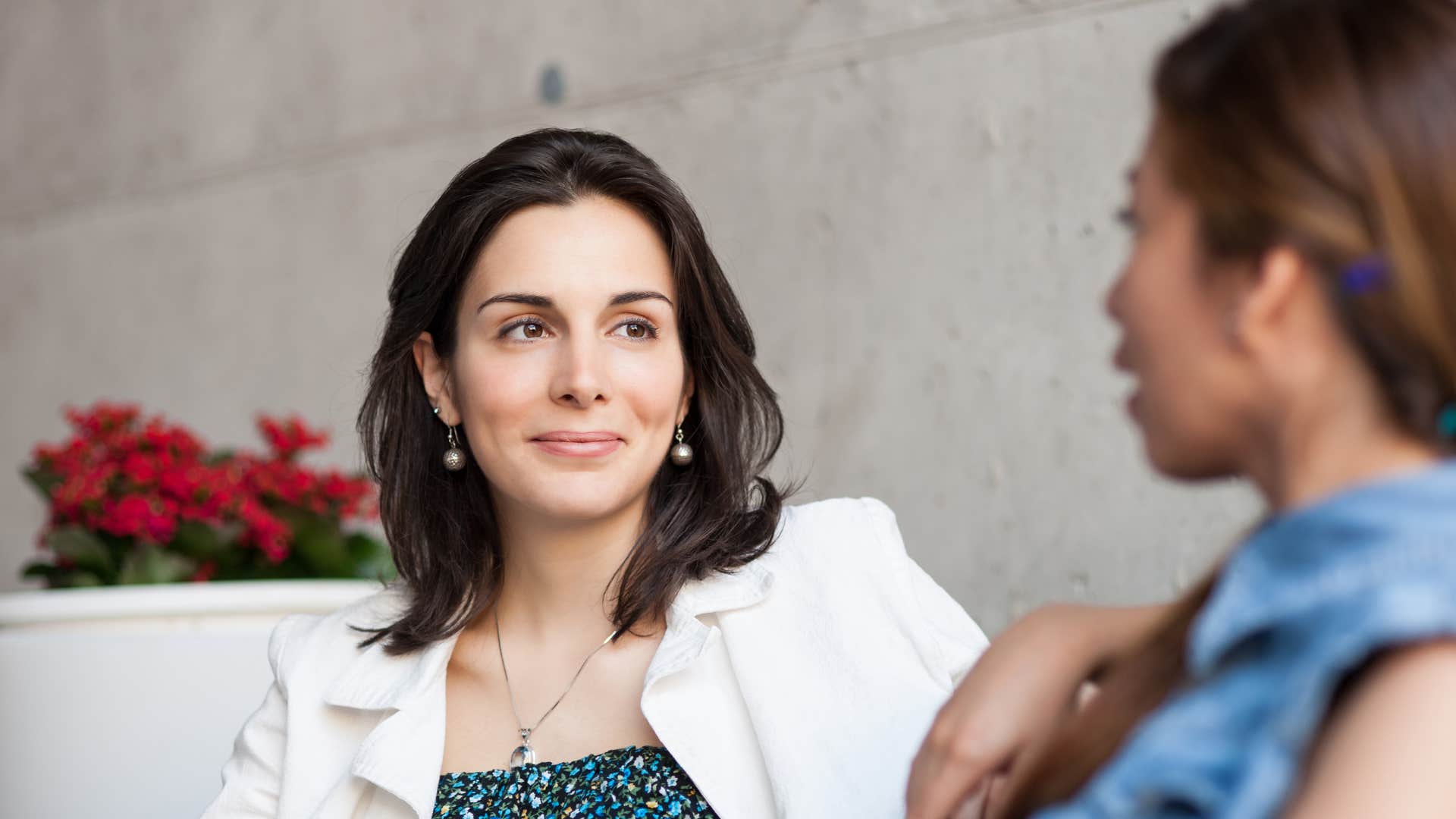 woman listening to friend speak