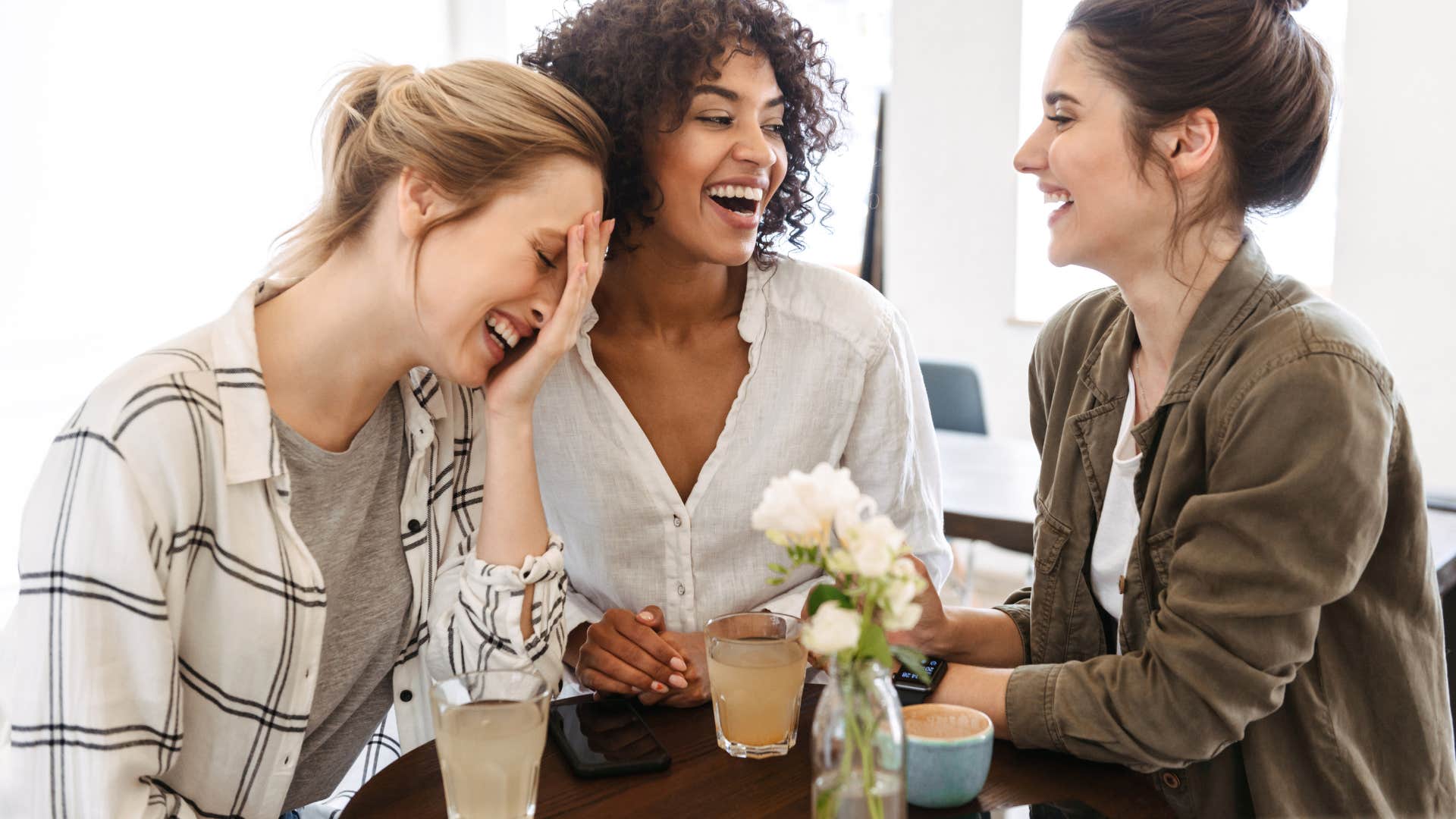 group of women friends laughing together