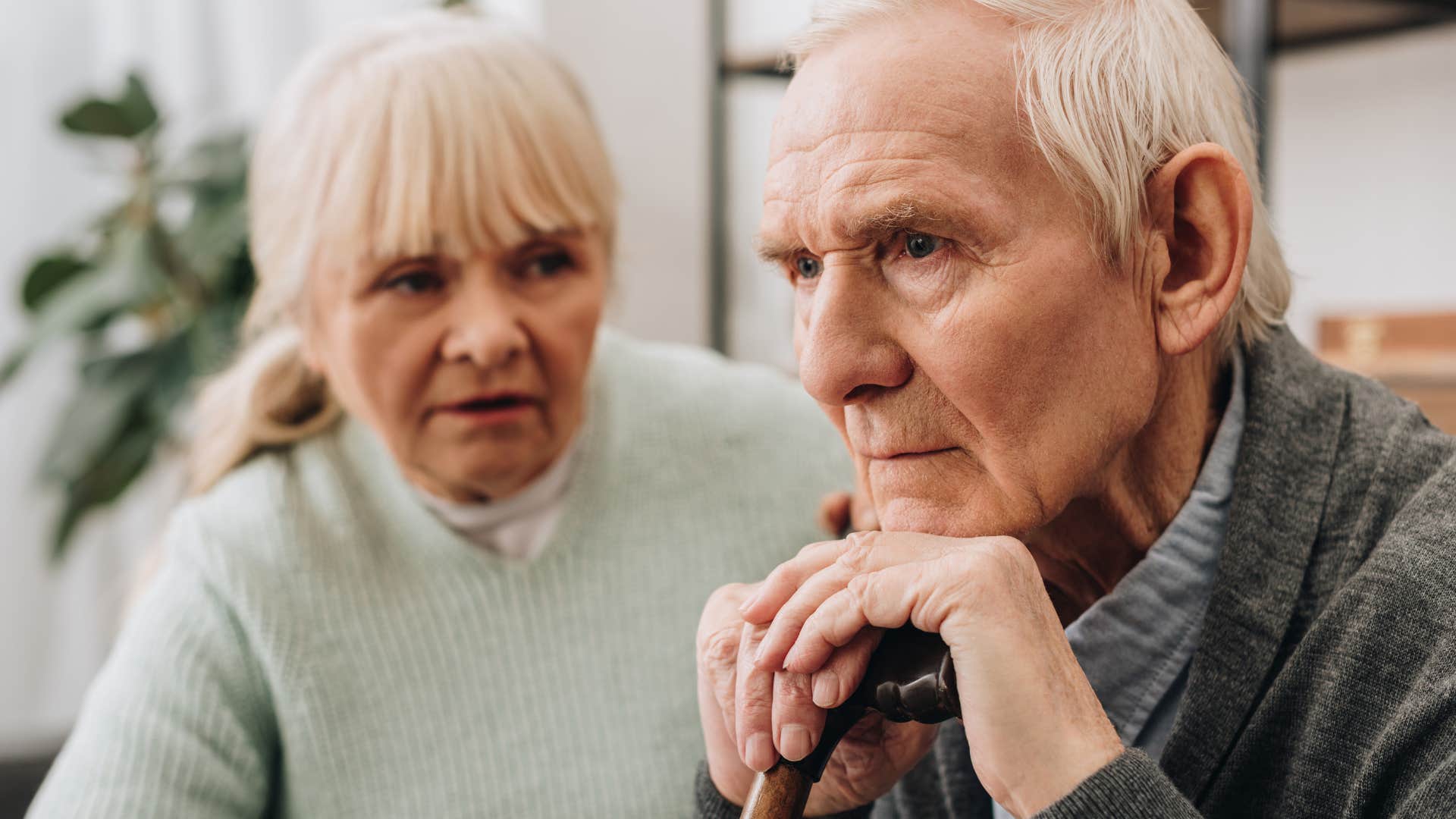 Man who projects his emotions sitting by his wife.