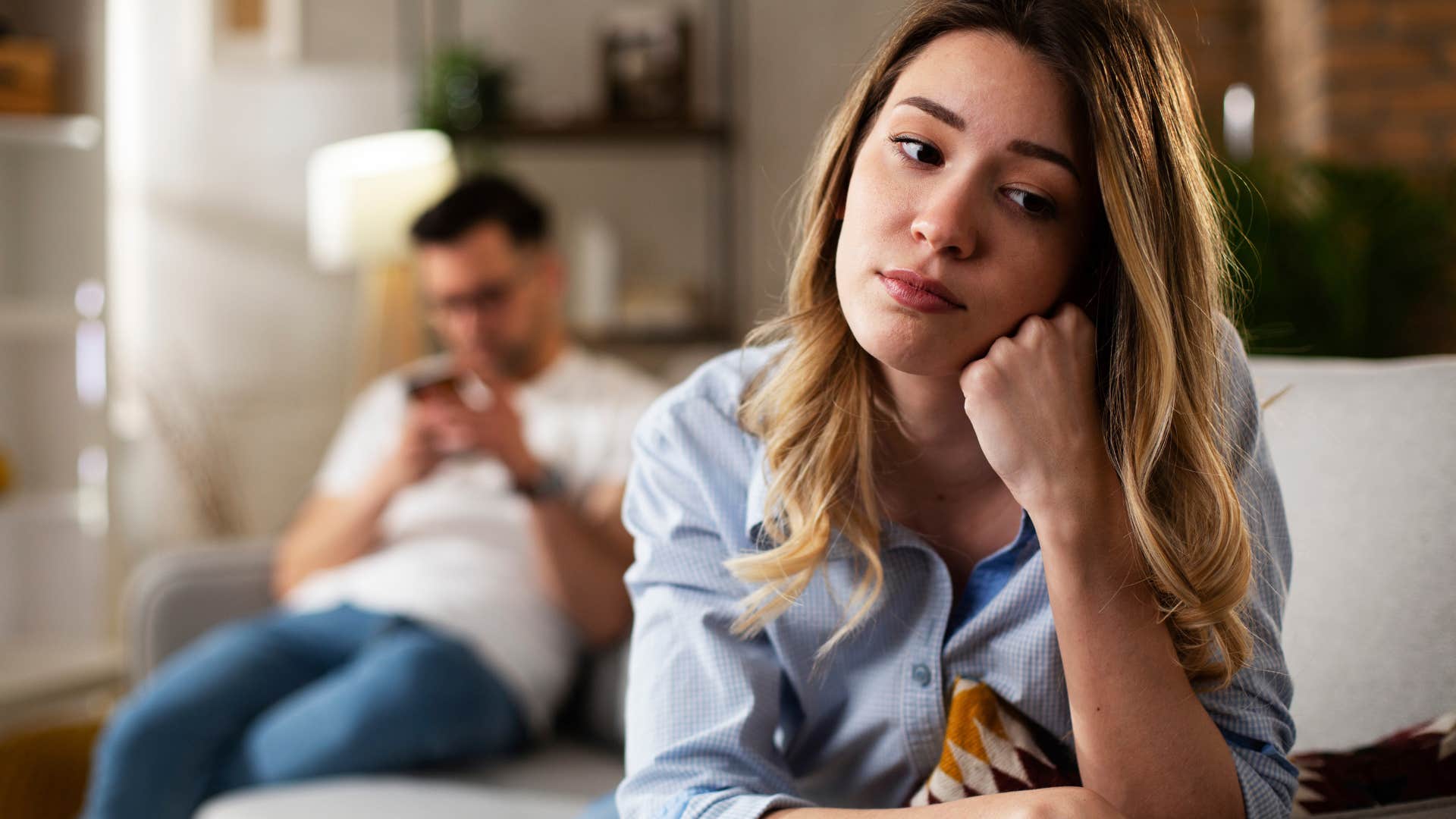 woman turned away from narcissistic partner who lacks empathy