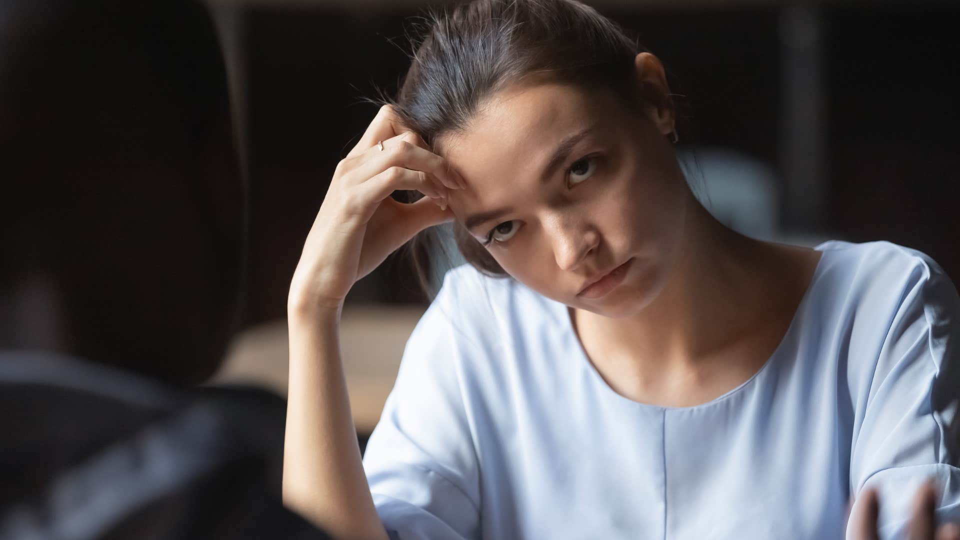 woman who doesn't take accountability looking at a friend