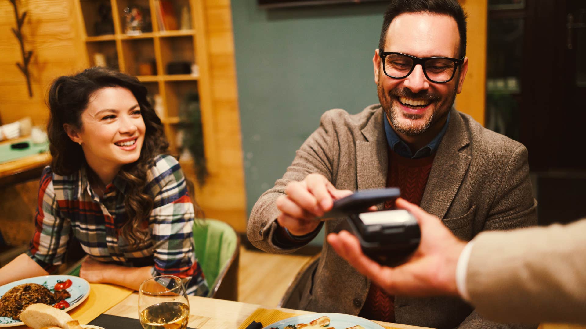man trying to buy someone's affection because he's desperate for friends and trying too hard to be liked 
