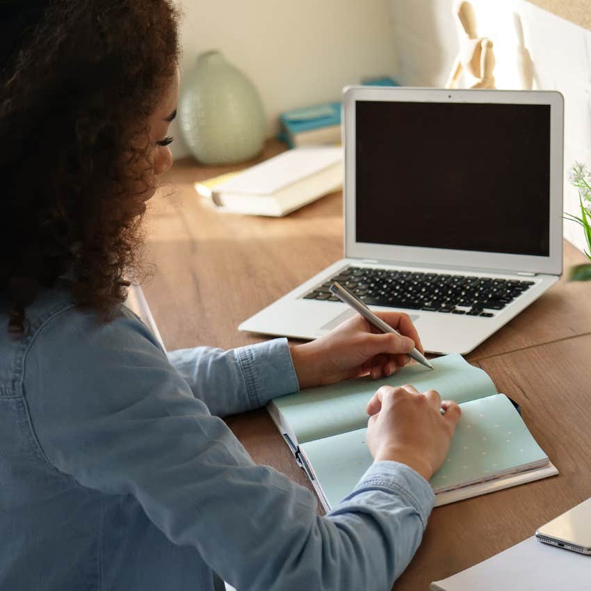 woman who is naturally self-aware making a bucket list