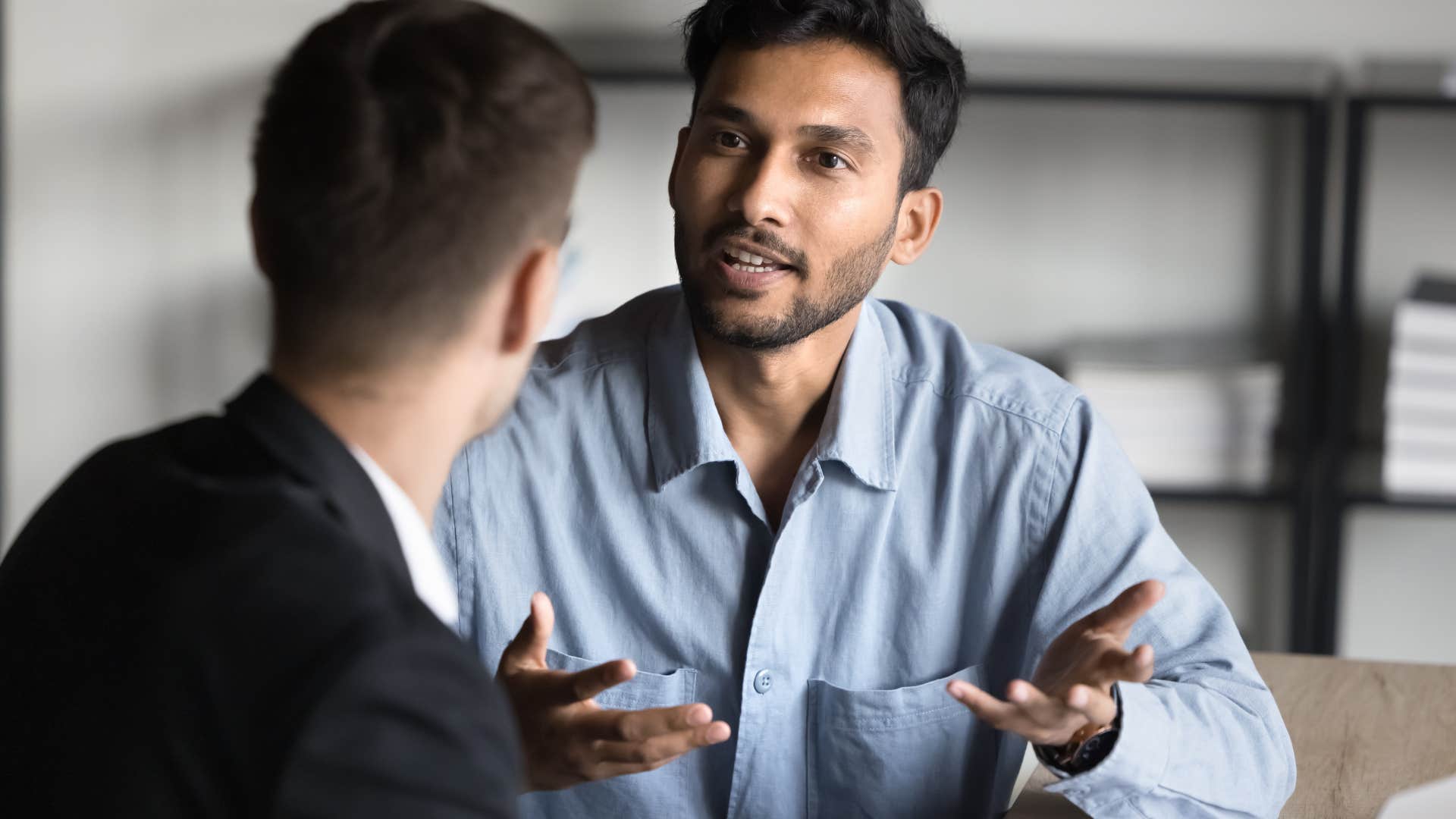 man who is naturally confident speaking with authority