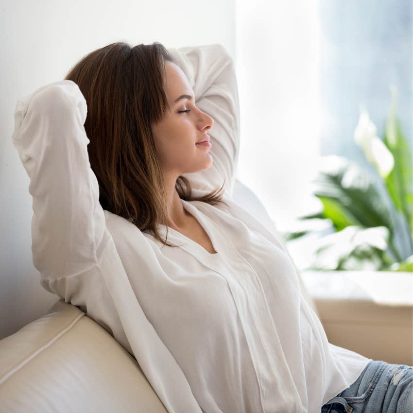 woman who is naturally zen feeling her feeligs