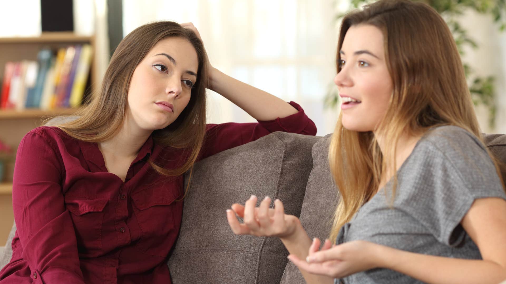 judgmental woman telling friend it must be nice