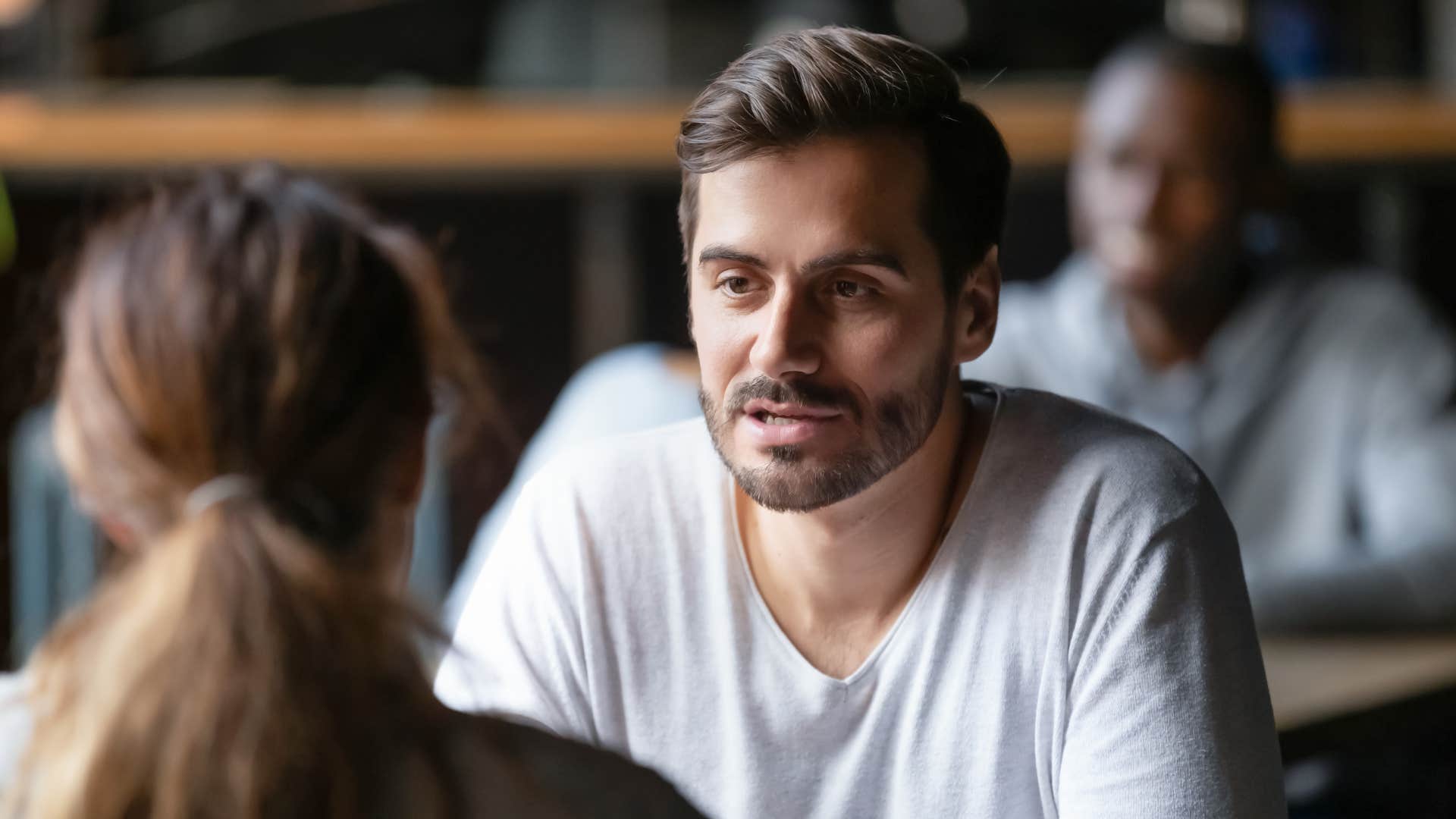 struggling man telling friend it could be worse