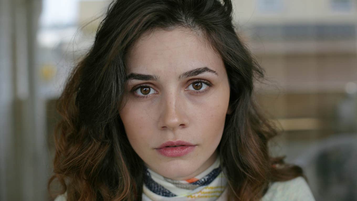 woman secretly struggling looking upset