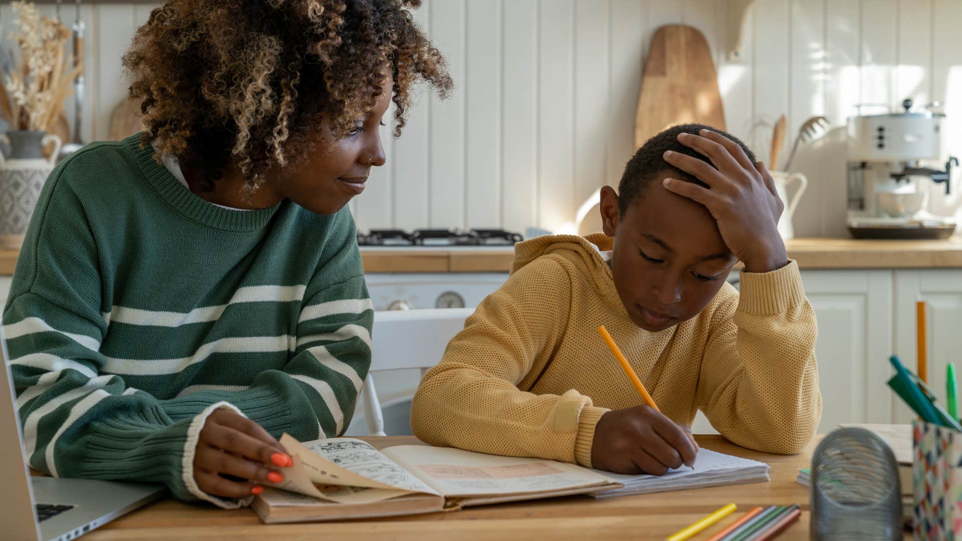 parent trying to help son with homework