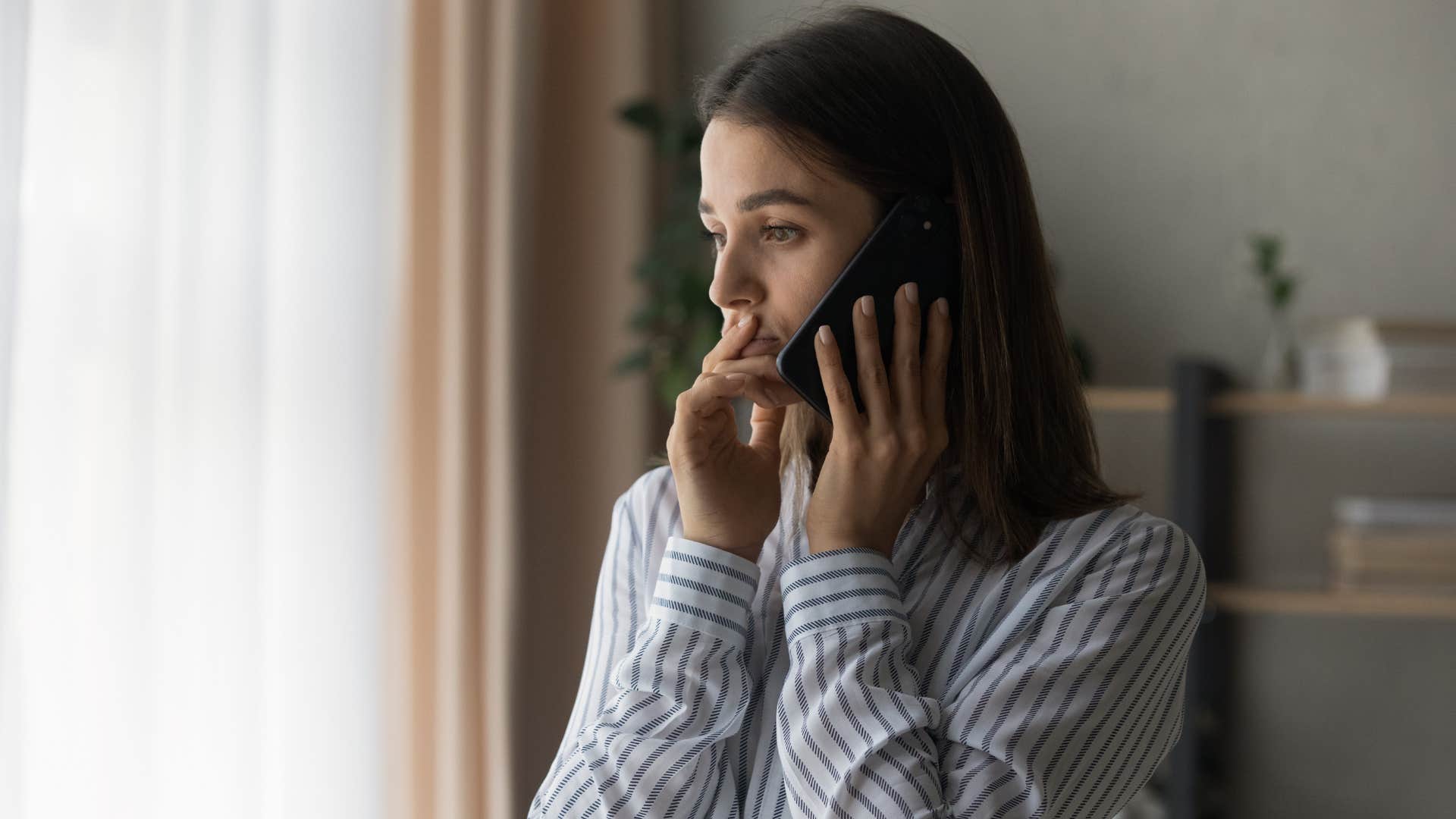 woman on the phone with her doctor