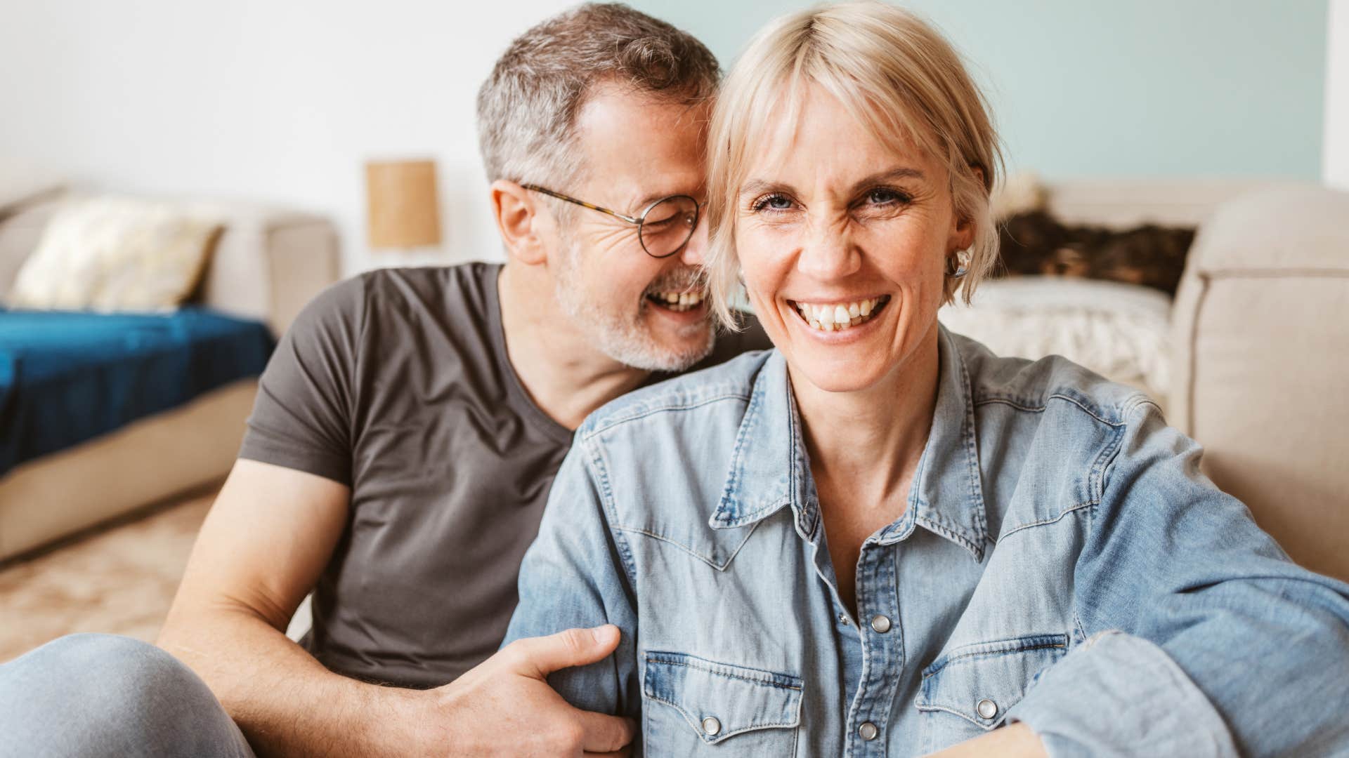 Woman hugging her husband and anticipating his needs.