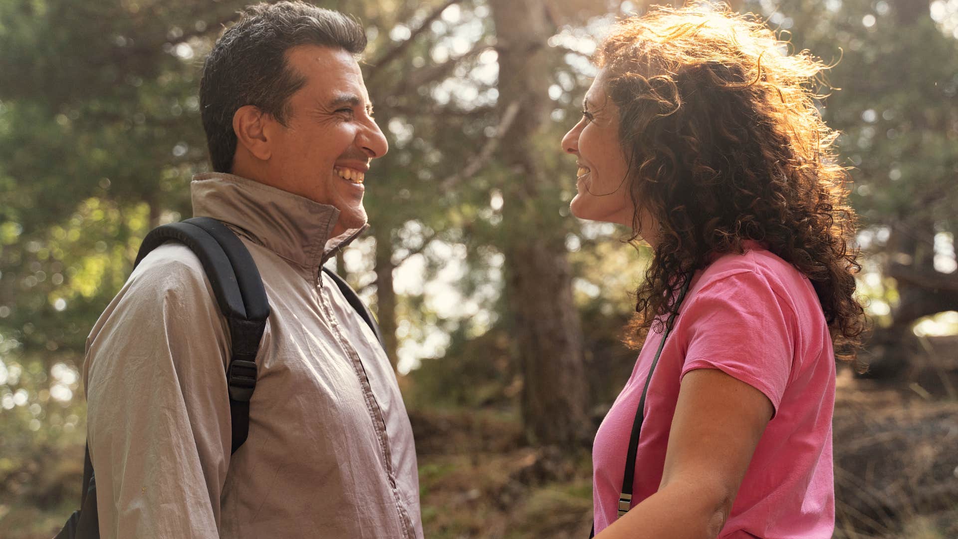 woman talking to a man who openly admires her