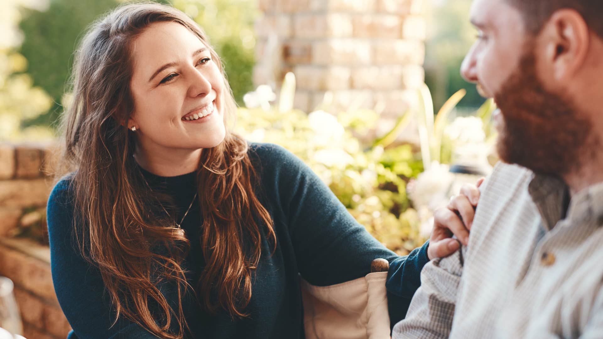 man using we instead of I talking to his happy partner