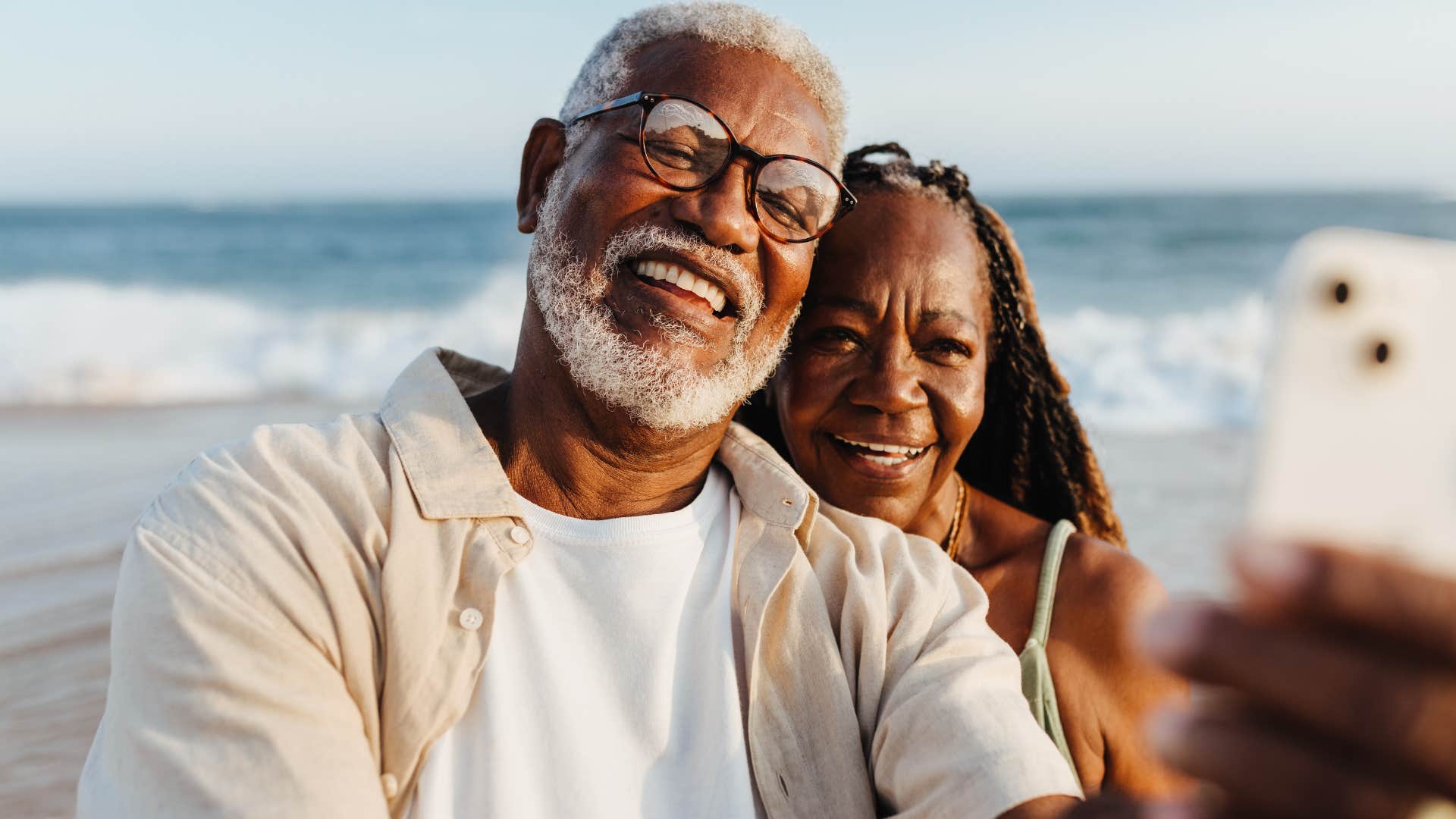 older couple with a deep relationship taking a selfie