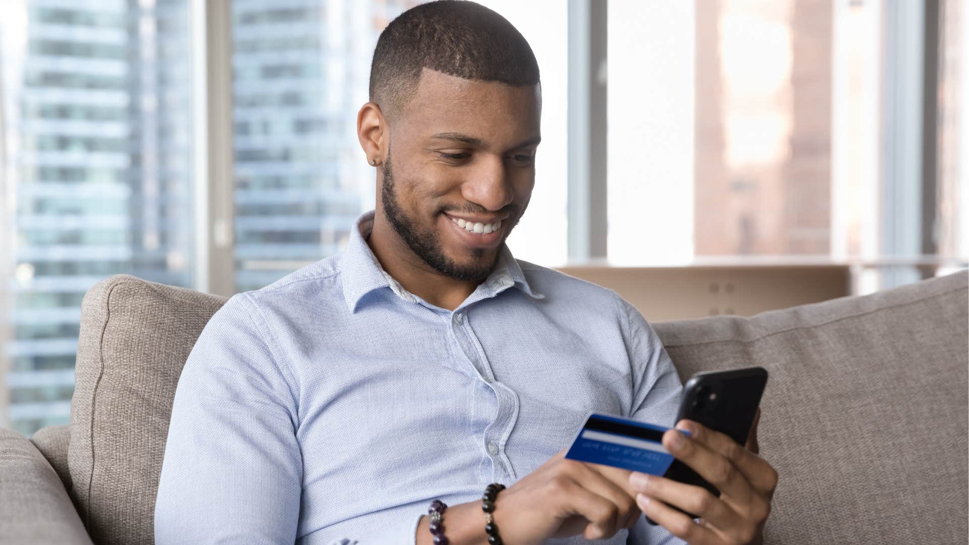 childfree man with financial flexibility spending money