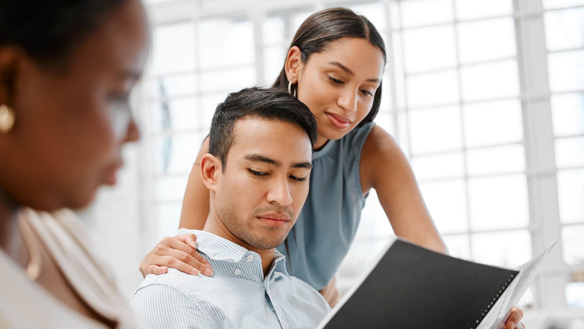 Unhappy person flirts with coworker