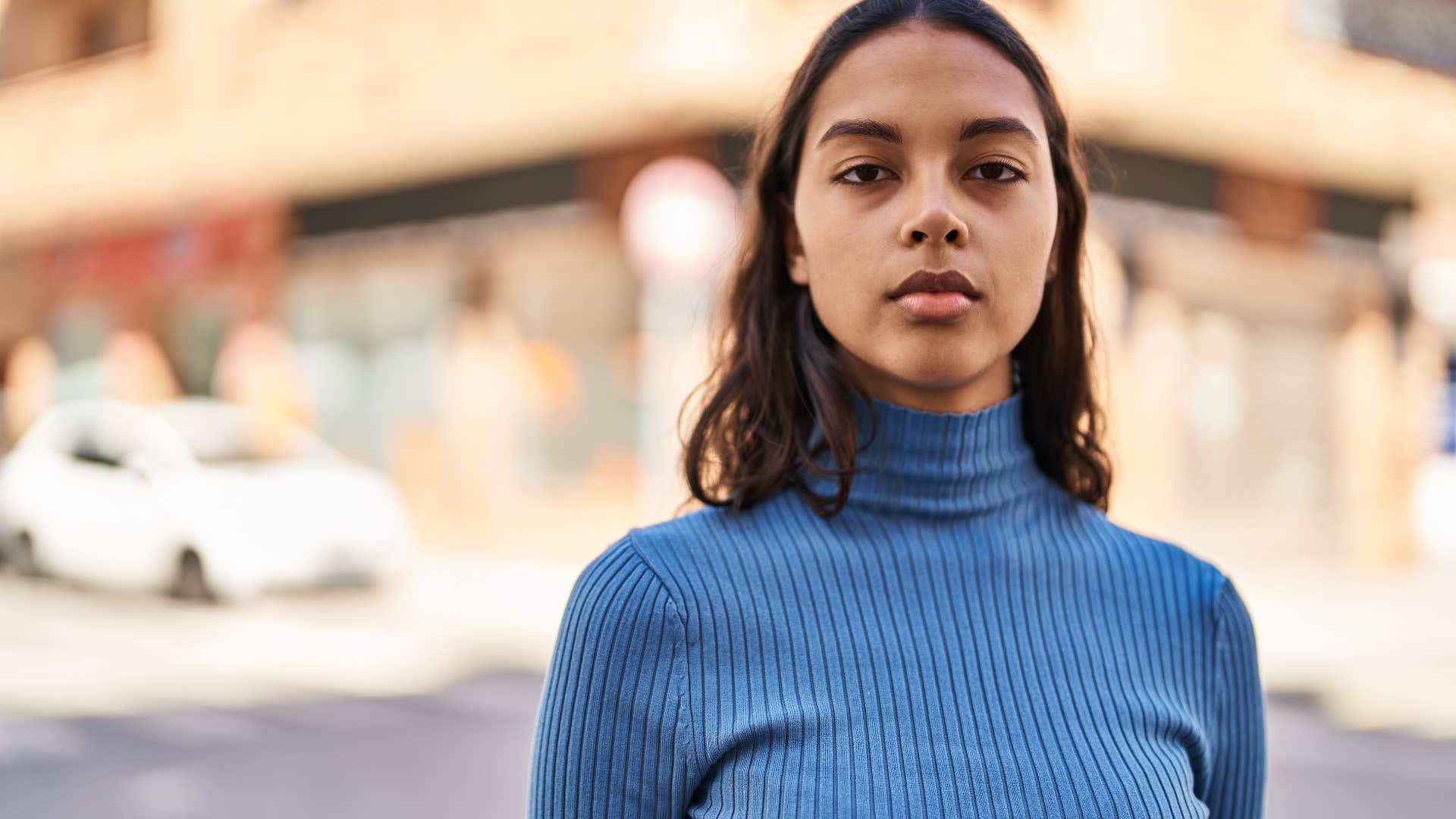 deeply unhappy woman saying she wishes she could start over