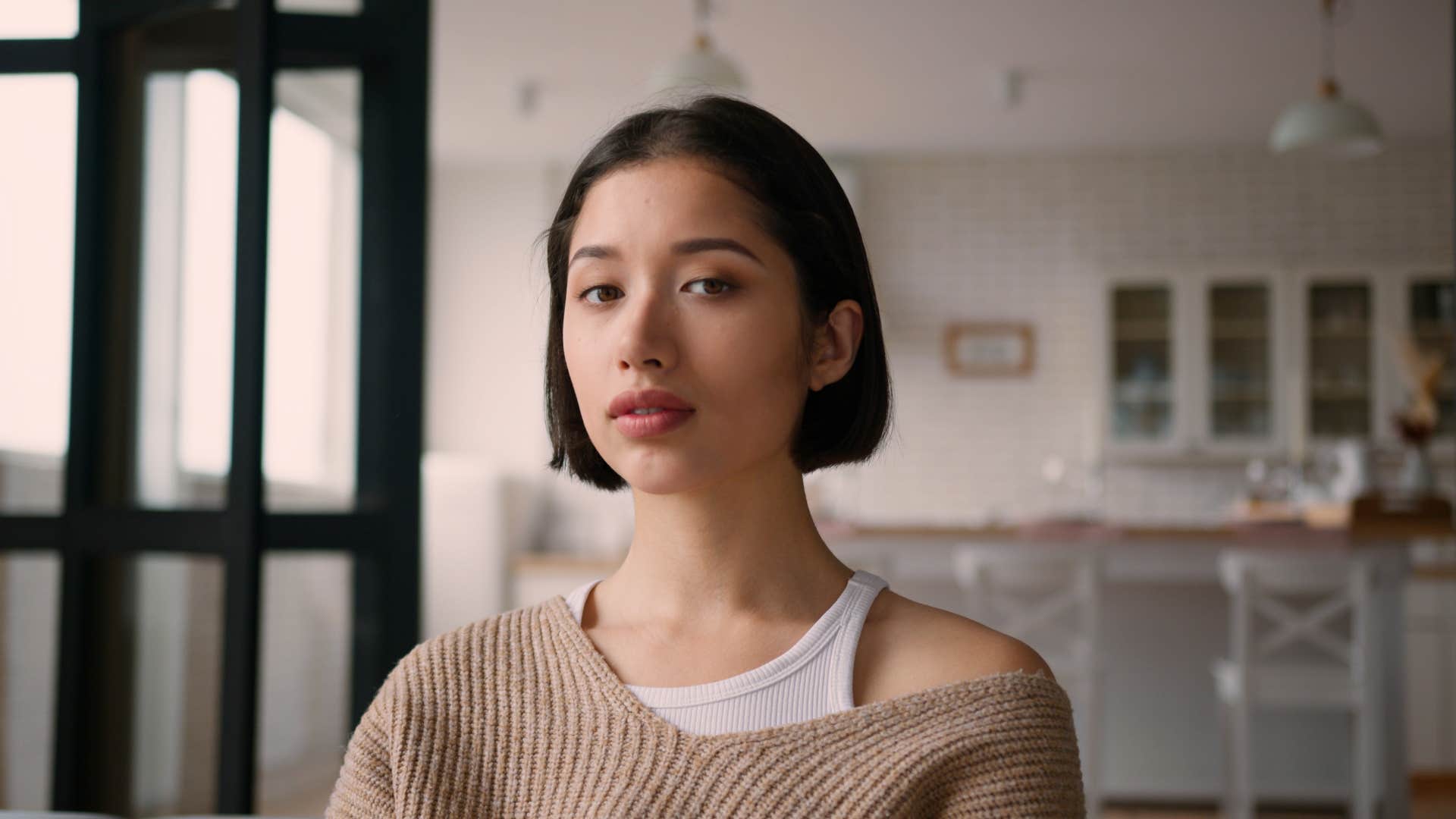 deeply unhappy woman saying she is second guessing herself
