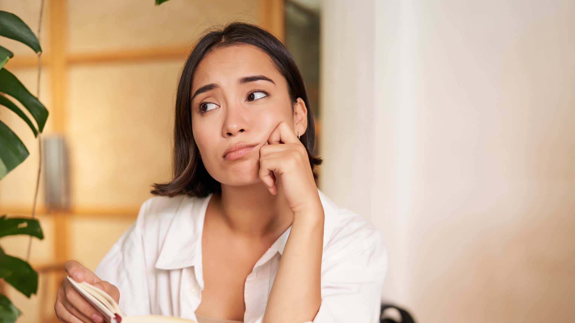 deeply unhappy woman saying she's tired