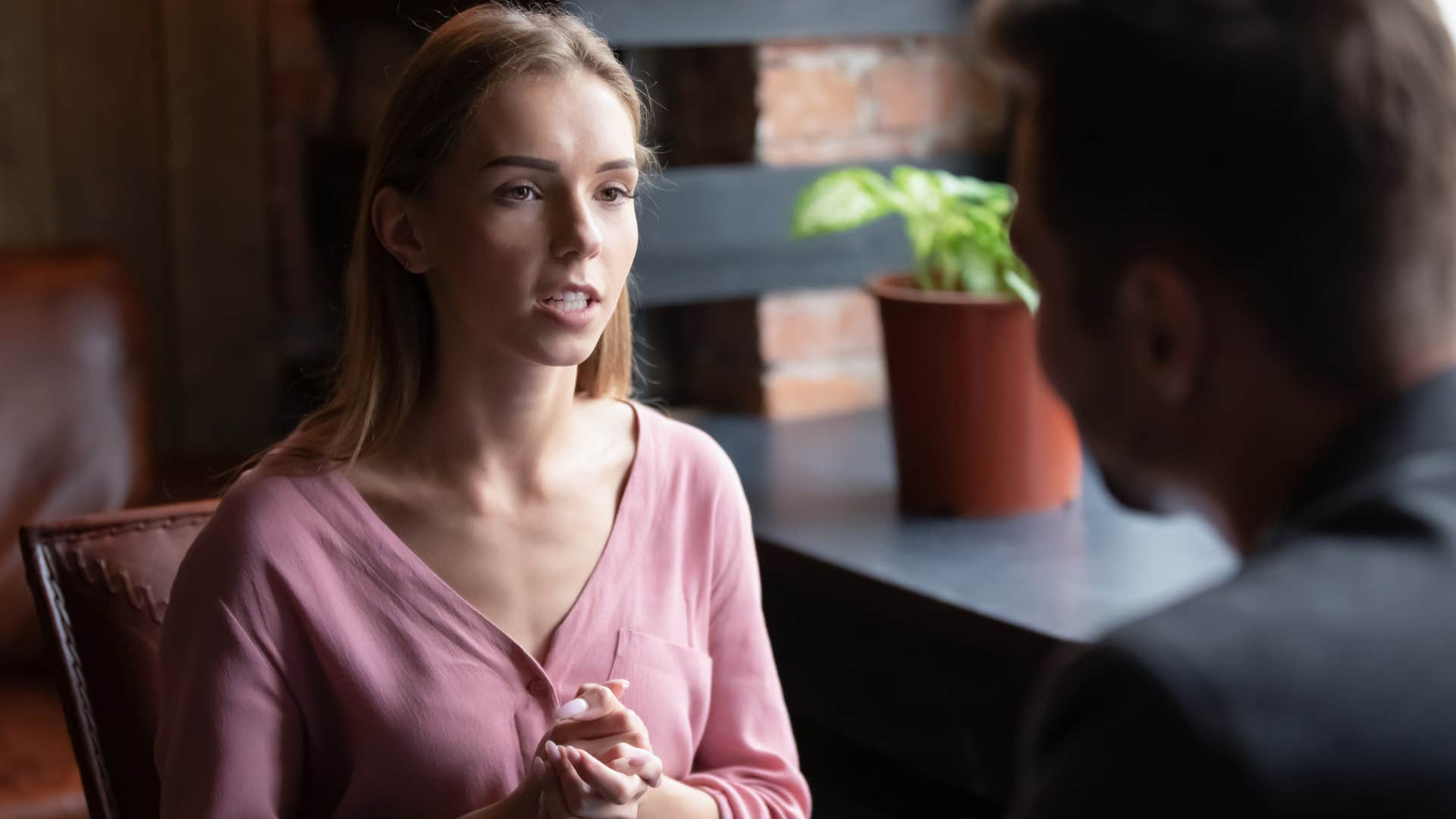 woman focused on growth in a relationship talking to man
