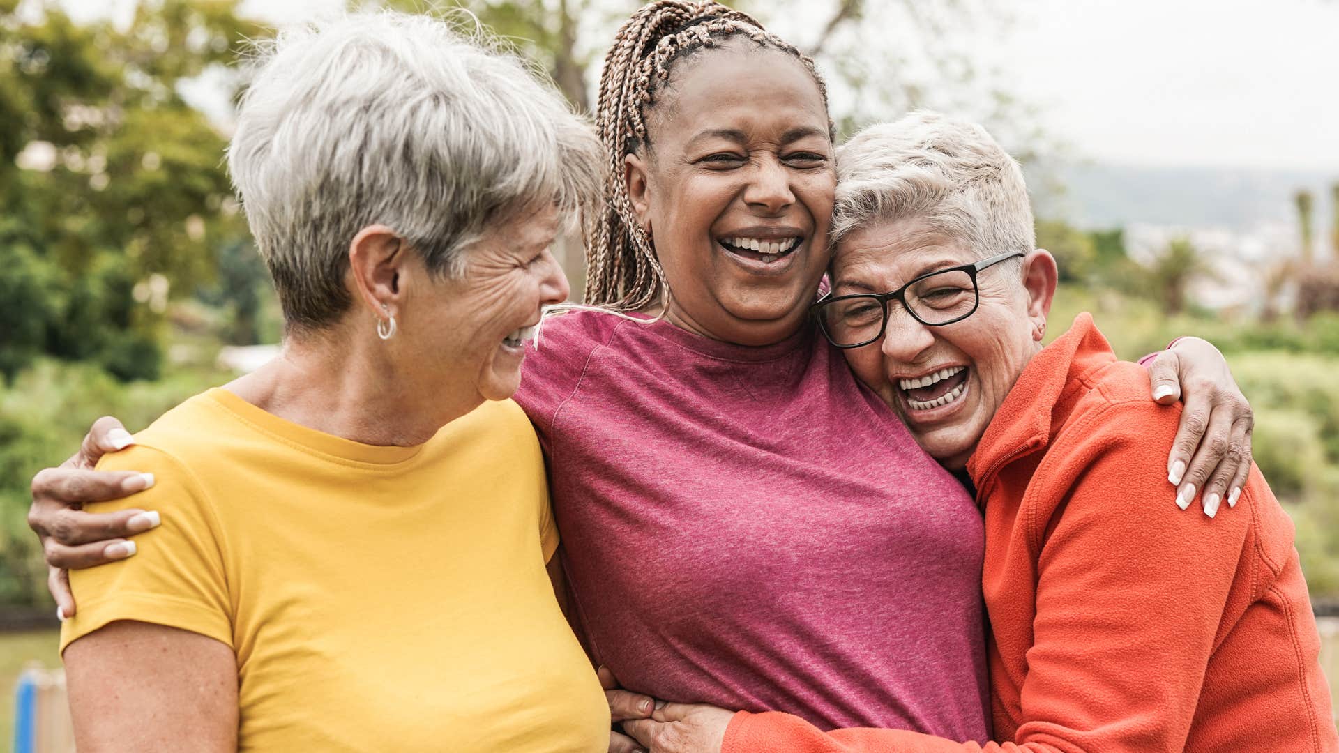 older women smiling hanging out together