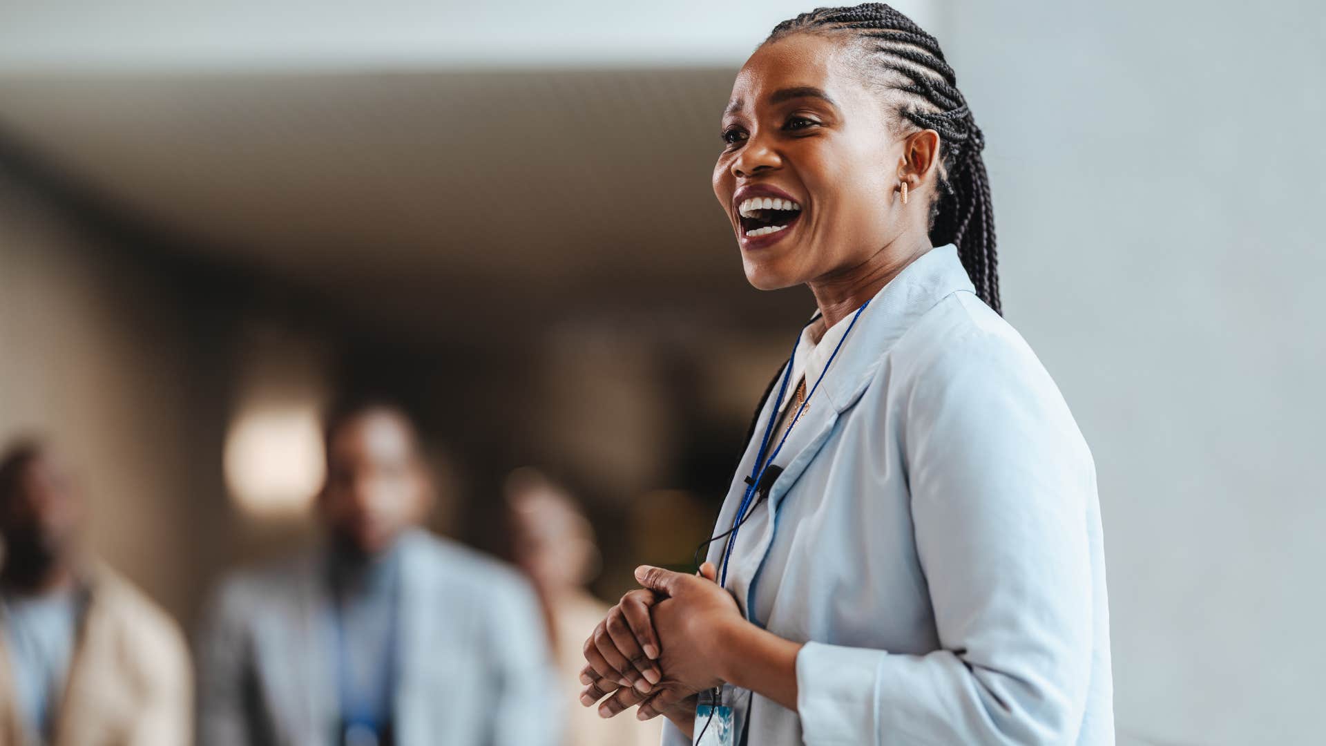 woman enjoying being the center of attention at work
