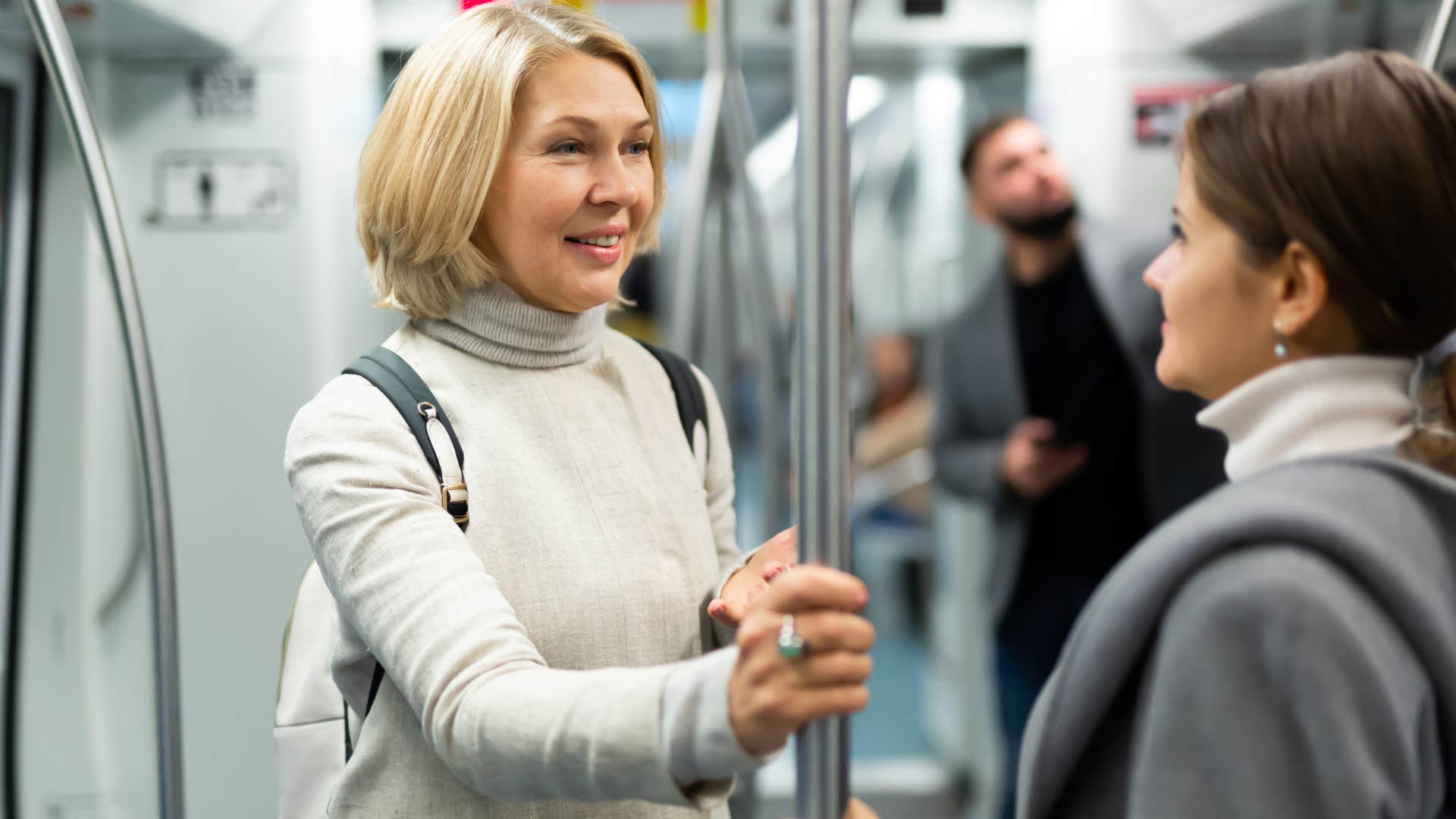 woman talking to strangers on the train
