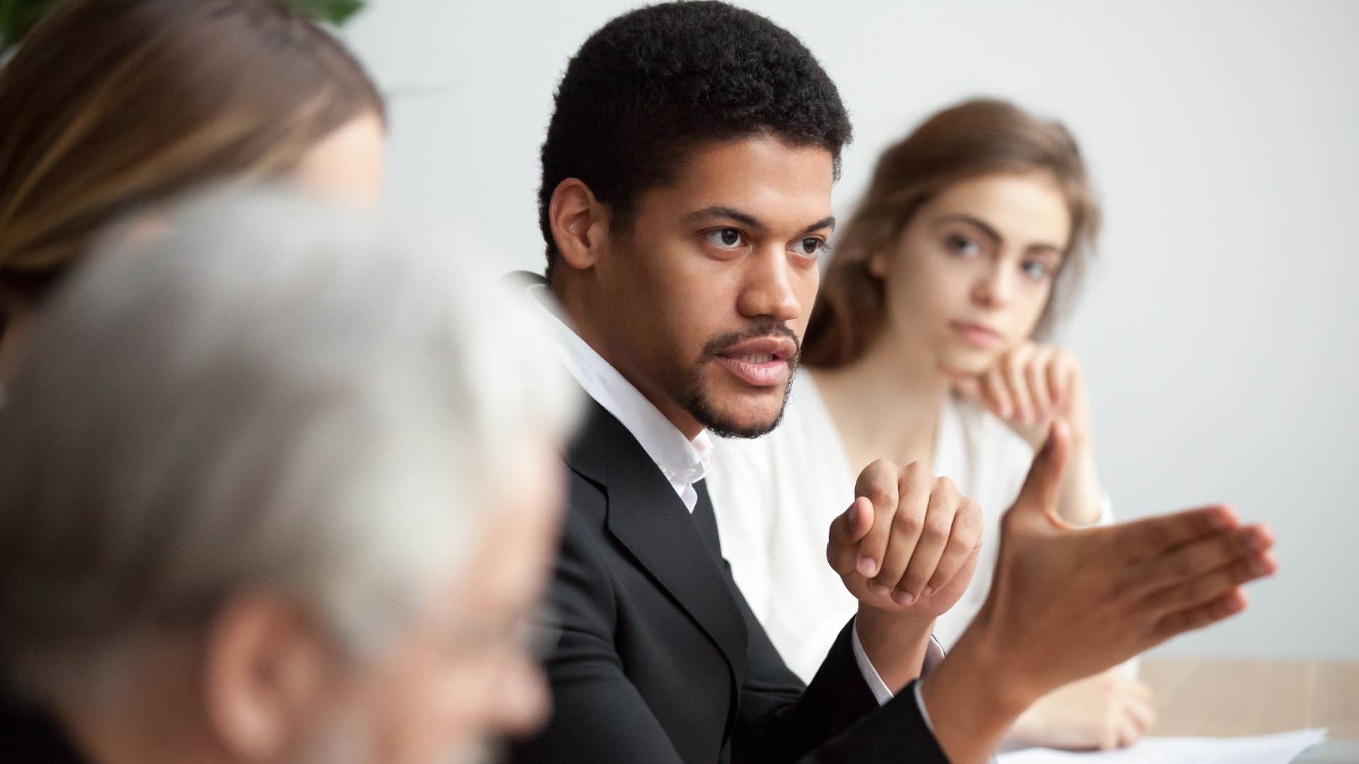 man equating cynicism to intelligence at work