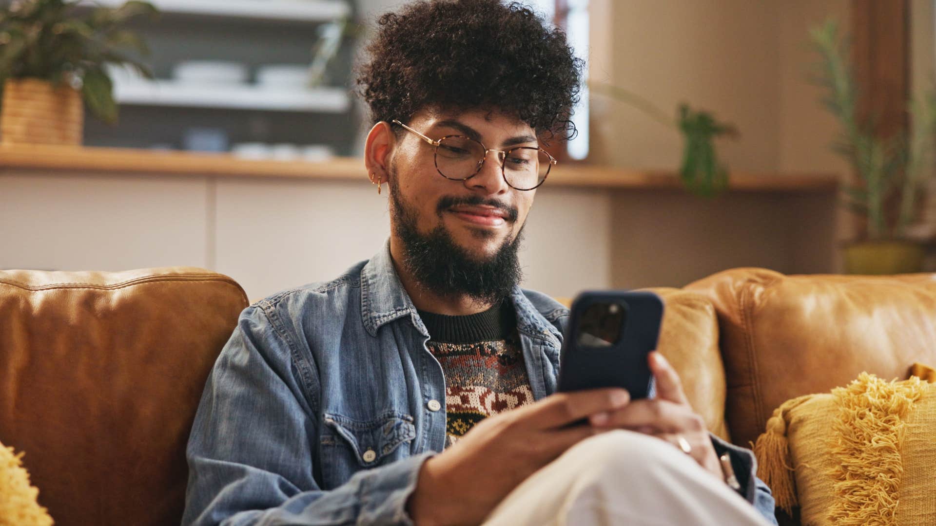 gen z man on his phone thinking self-diagnosis is self-awareness