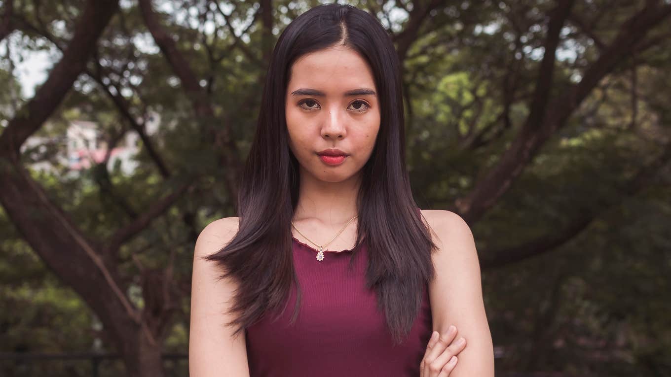 young gen z girl thinking about life looking sad